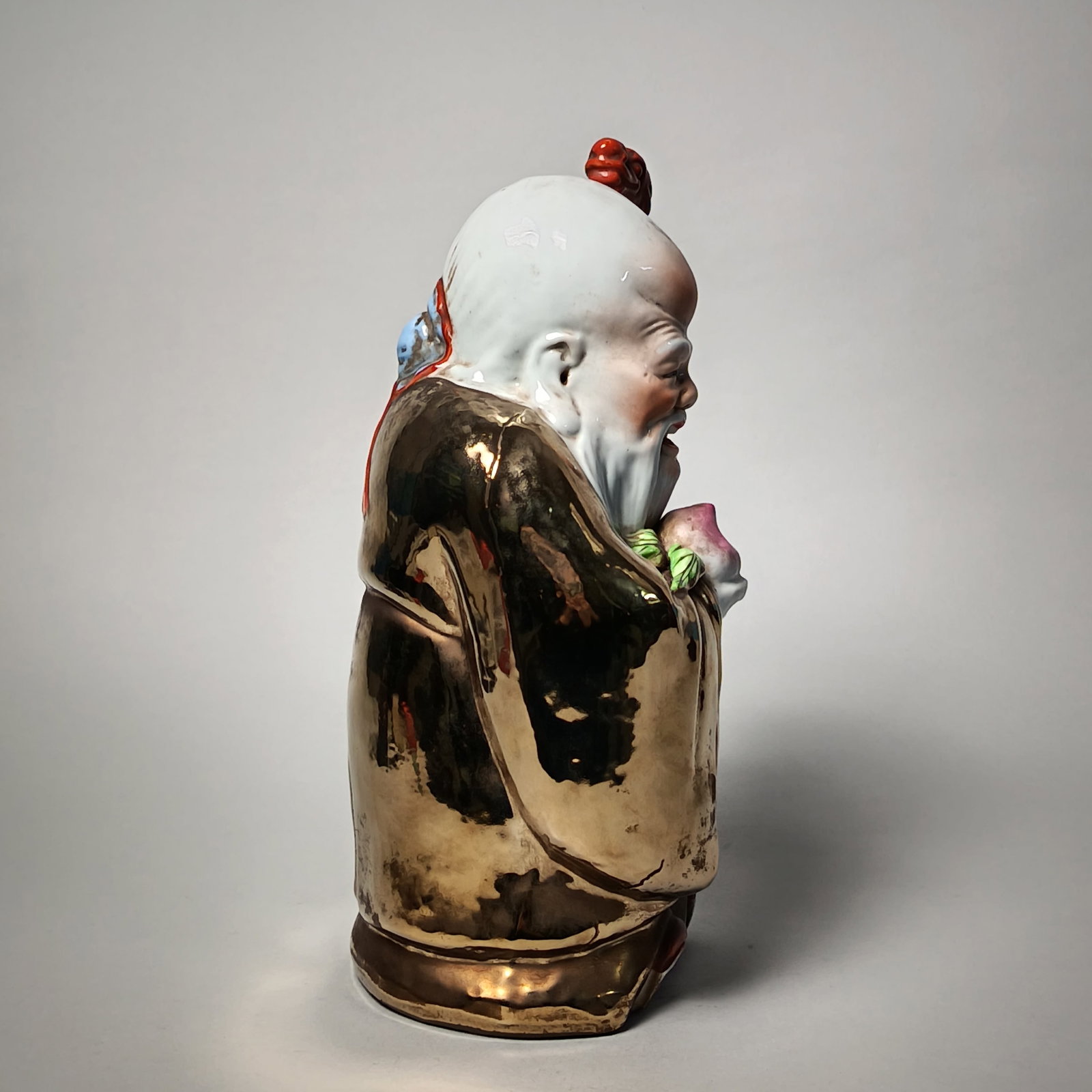 Gold-colored figurine - 2