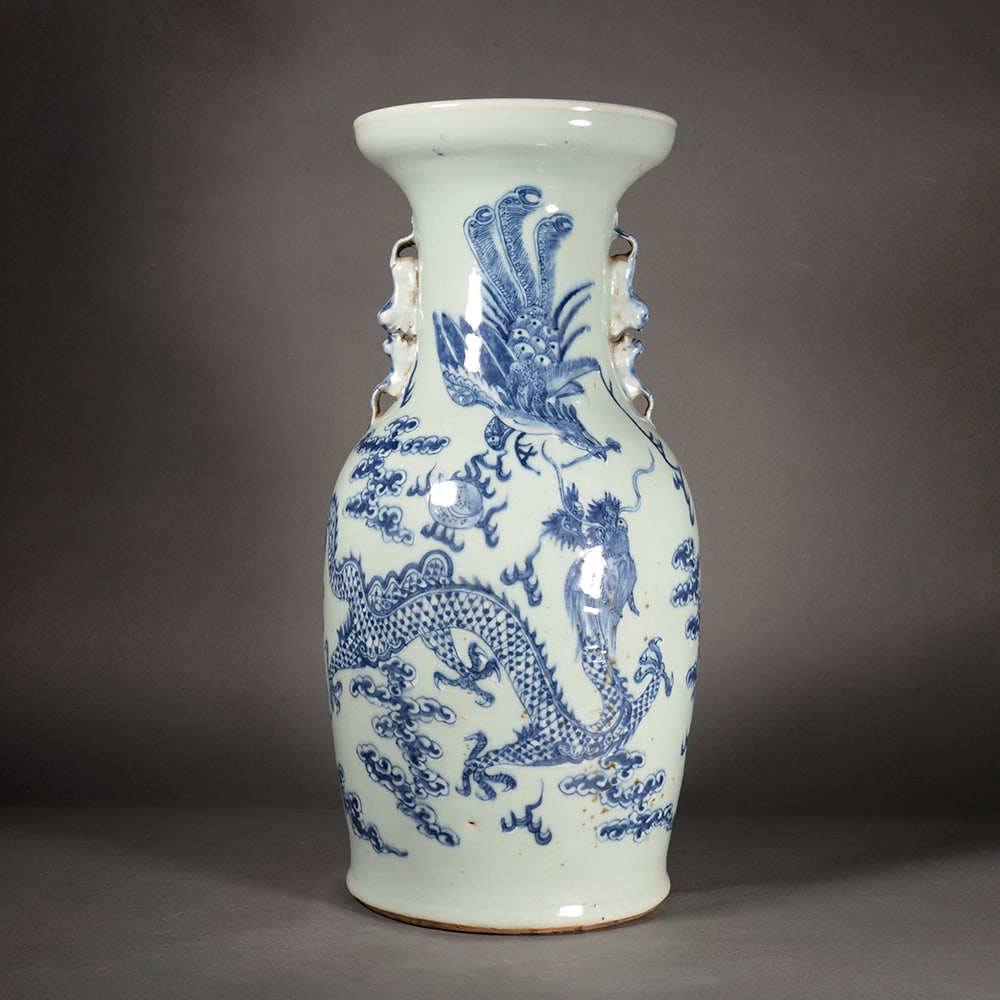 Greenish-blue glazed blue-and-white lotus and phoenix pattern double-eared bottle: Name Greenish-blue glazed blue-and-white lotus and phoenix pattern double-eared bottle Dimensions 44cm *19cm Condition Additional photographs and condition reports are available upon request as a