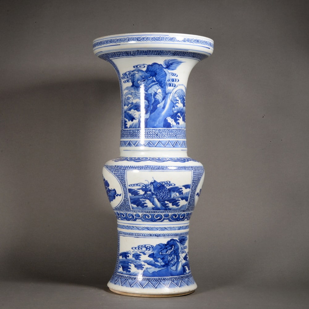 Blue and white glazed flower-shaped cup with sea waves and auspicious beasts pattern: Name Blue and white glazed flower-shaped cup with sea waves and auspicious beasts pattern Dimensions 45.5CM*22CM Condition Additional photographs and condition reports are available upon request as a
