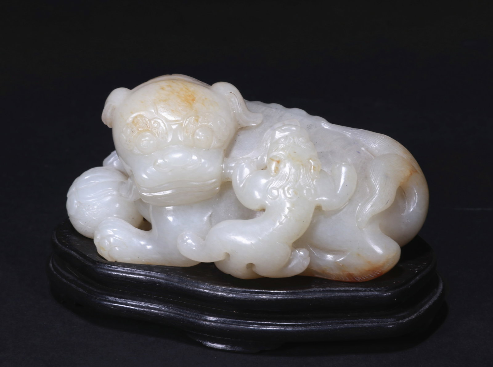 White jade lion figurine: Name White jade lion figurine Dimensions D 9CM H 4.8CM Condition Additional photographs and condition reports are available upon request as a courtesy to our clients. Any condition report represents