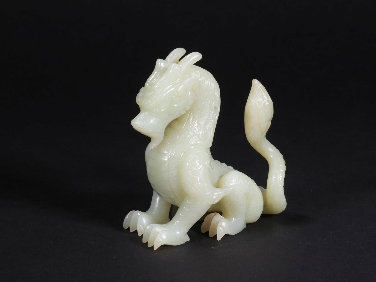 White Jade Dragon-shaped Decorative Piece: Name White Jade Dragon-shaped Decorative Piece Dimensions 9CM*8CM Condition Additional photographs and condition reports are available upon request as a courtesy to our clients. Any condition report