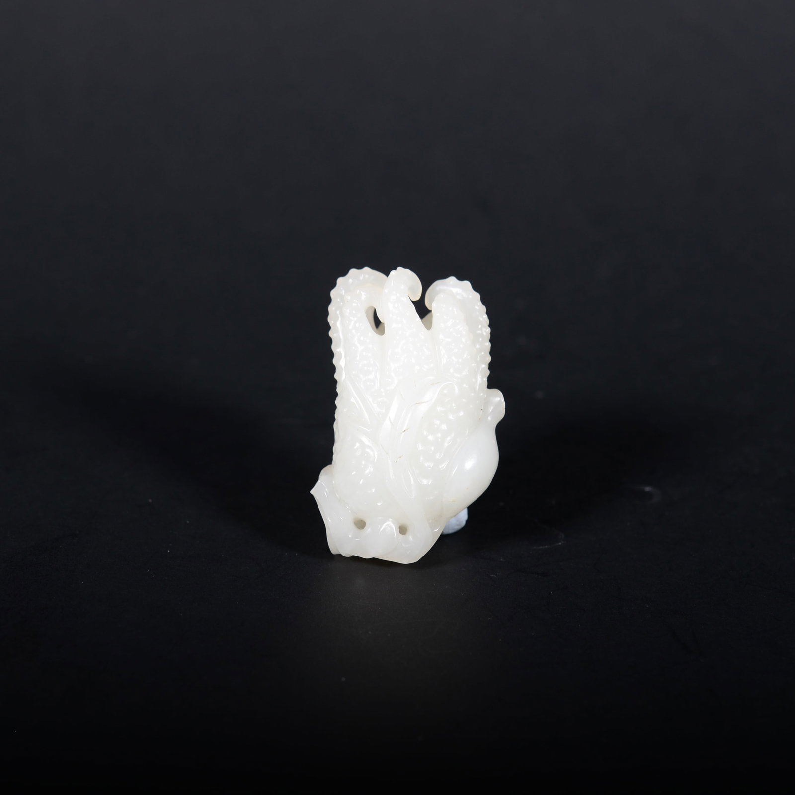 White jade Buddha hand-shaped carving - 2