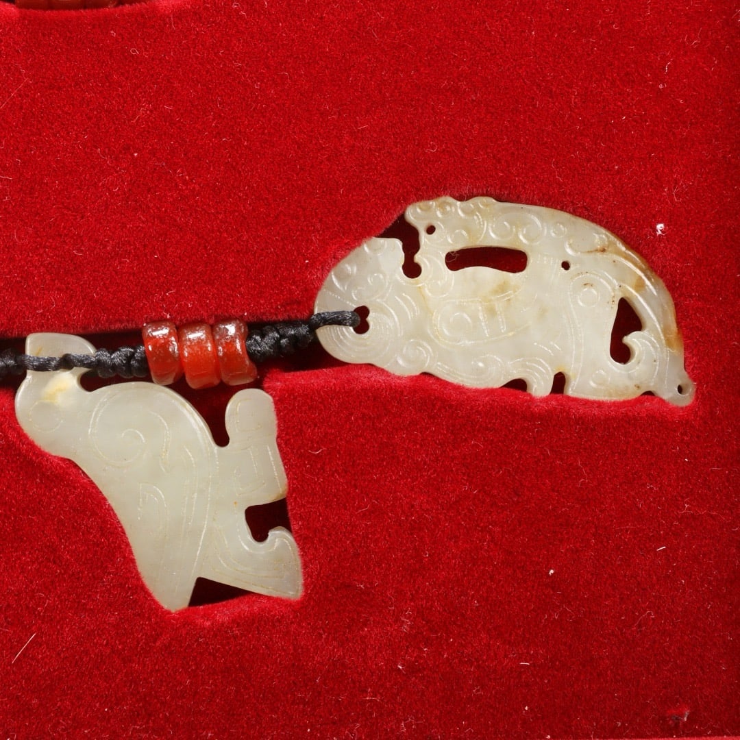 A set of white jade pendants - 9