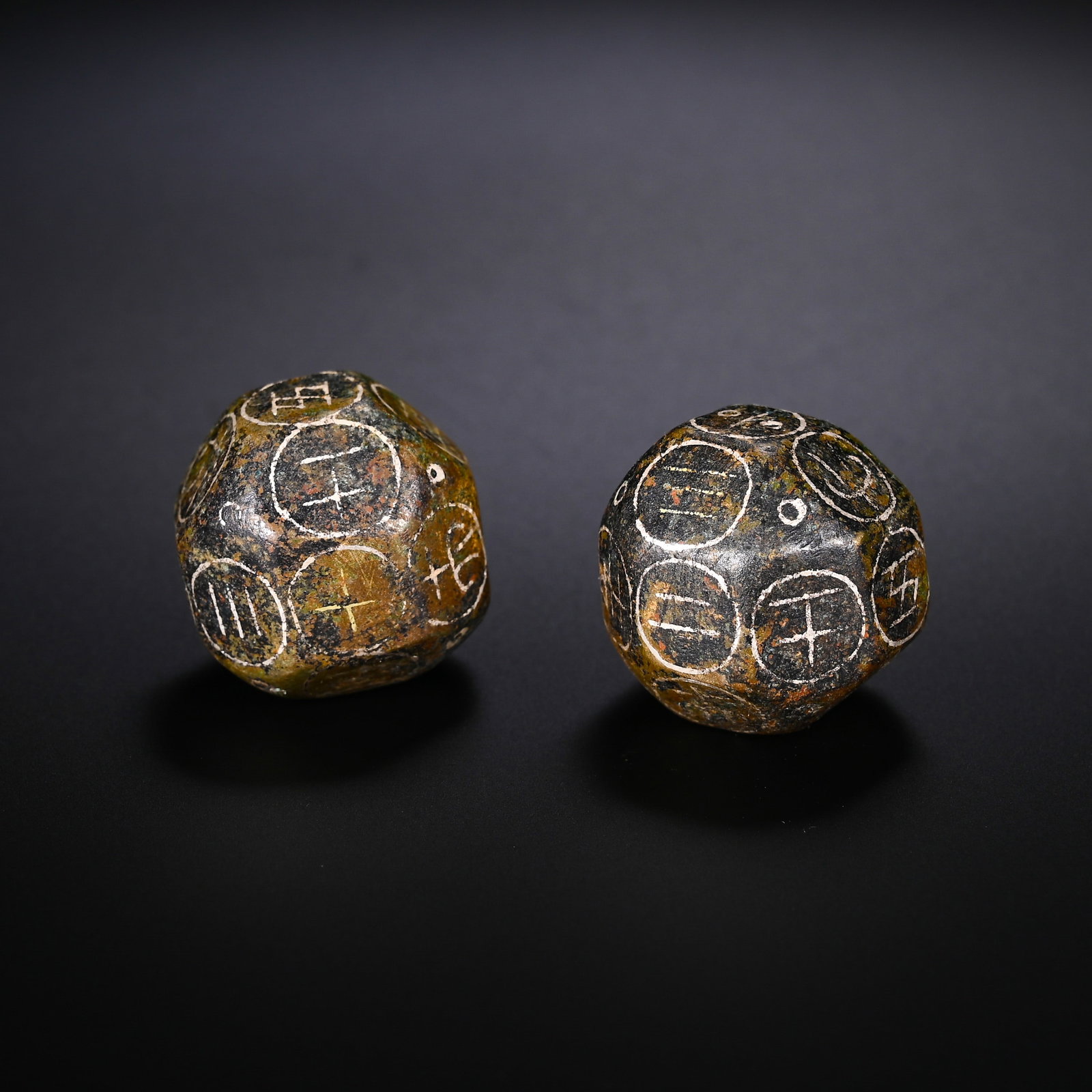 PAIRS OF BRONZE DODECAHEDRAL BORONS FROM THE HAN DYNASTY (1 of 6)