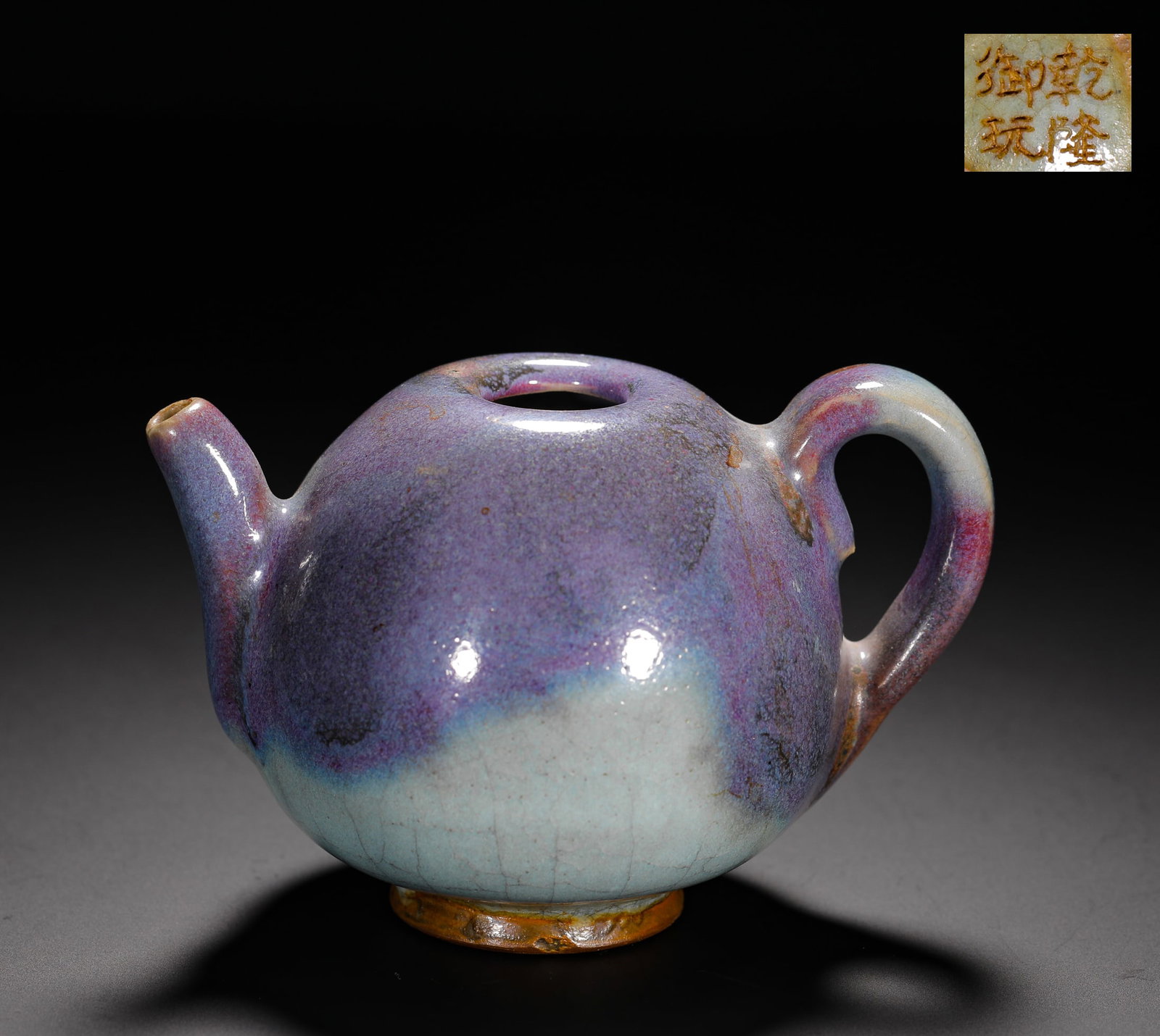 SONG DYNASTY JUN KILN ROSE PURPLE GLAZE WATER INFUSION: H:7.5cm(2.95in) D:11.5cm(4.53in) Weight:200g(0.44lb)This is a Song Dynasty Jun Yao water dropper, a scholar??s object used to add water to an inkstone. It has a plump, teapot-shaped form with a short 