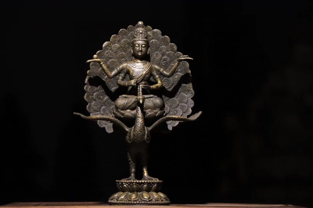 BRONZE PEACOCK STATUE OF THE BODHISATTVA MINGWANG FROM THE MING DYNASTY