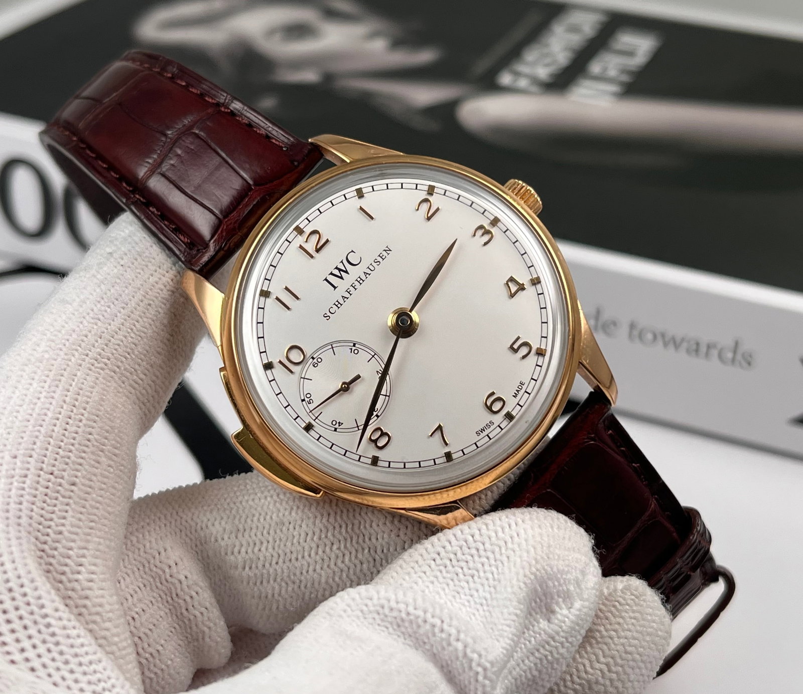 IWC PORTUGUESE 8K ROSE GOLD CASE: 43mm 18K rose gold case, white rhodium-plated dial, manual mechanical movement, 43-hour power reserve, limited to 250 pieces worldwide