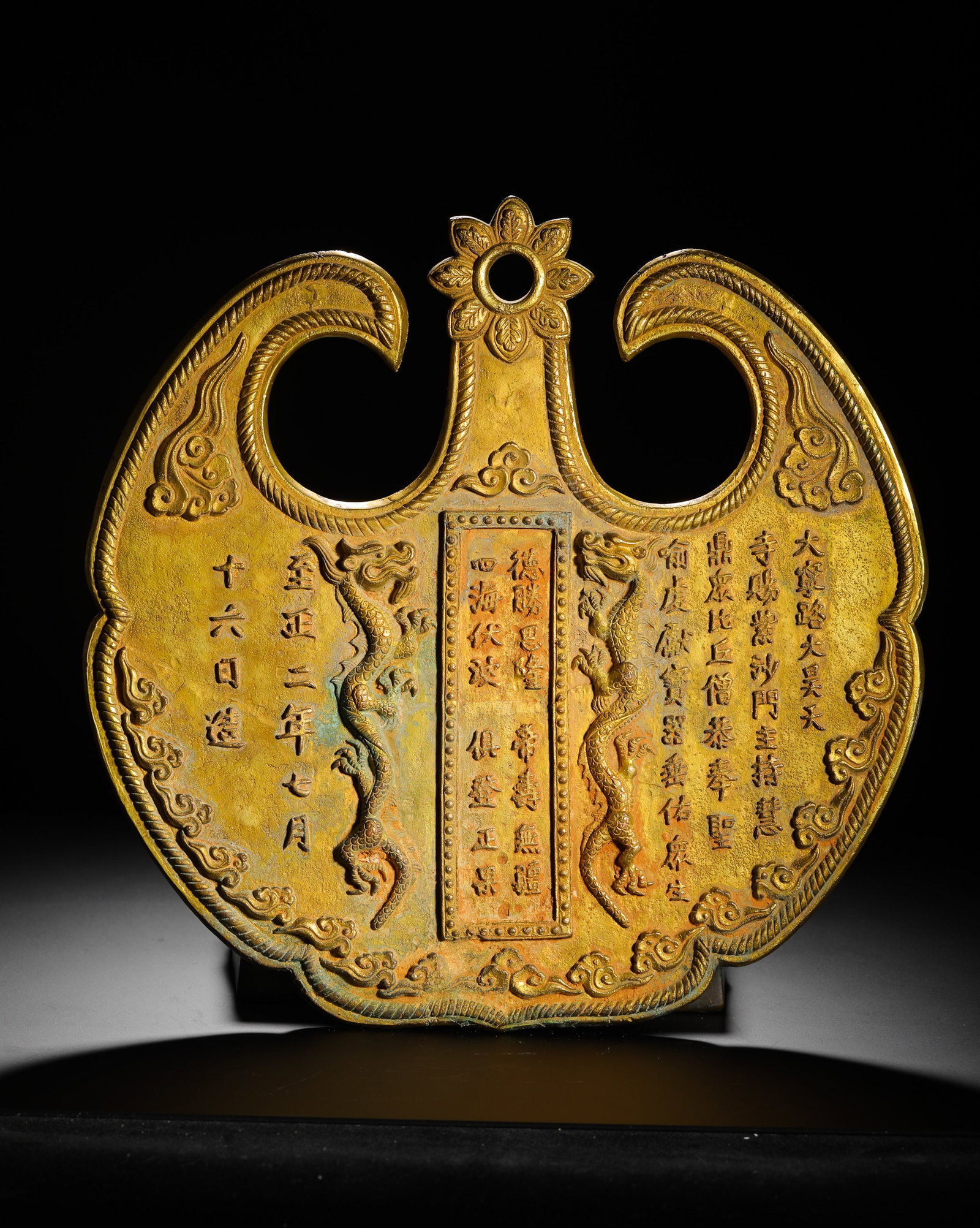 BRONZE GILDED IMPERIAL TOKEN OF THE YUAN DYNASTY: H:33cm (12.99in) W:34cm (13.39in) Weight:5930g (13.07lb)Issued by the Yuan emperor to temples or monks, these plaques granted special privileges, offering valuable insights into Yuan religious
