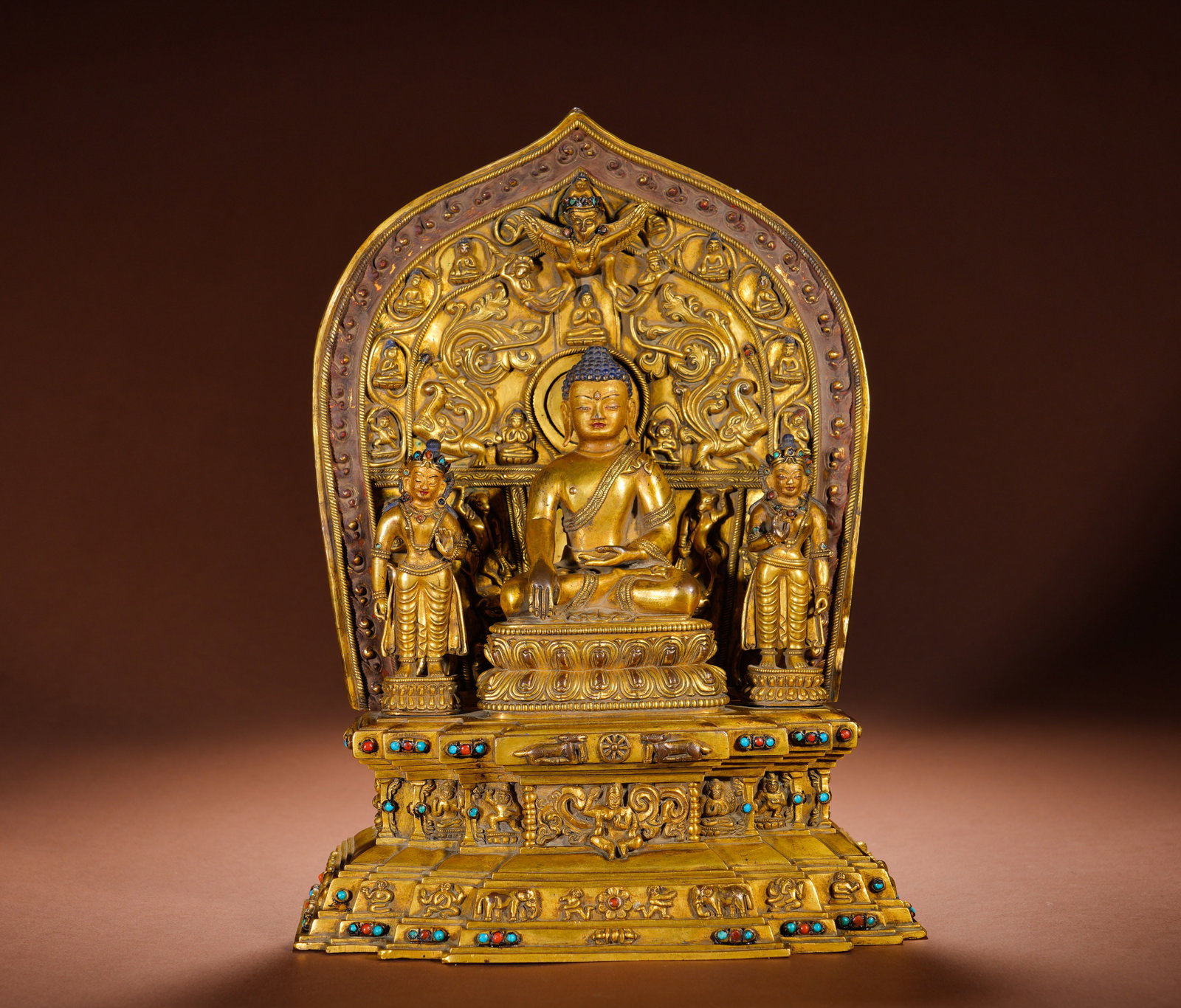 THREE GILDED BRONZE STATUES OF SAKYAMUNI FROM THE QING DYNASTY