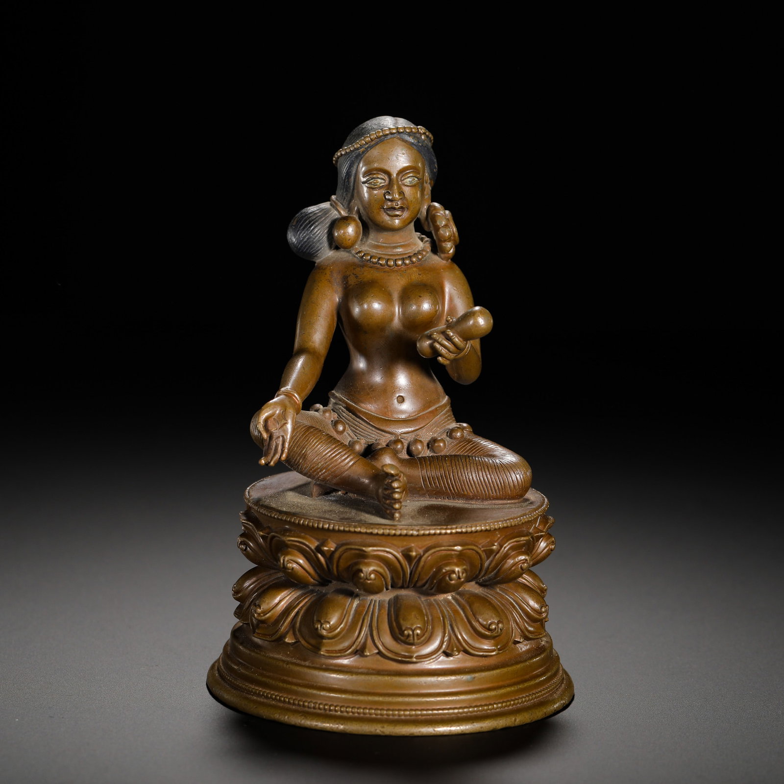 A BRONZE STATUE OF THE FREE AND VOID MOTHER OF THE QING DYNASTY