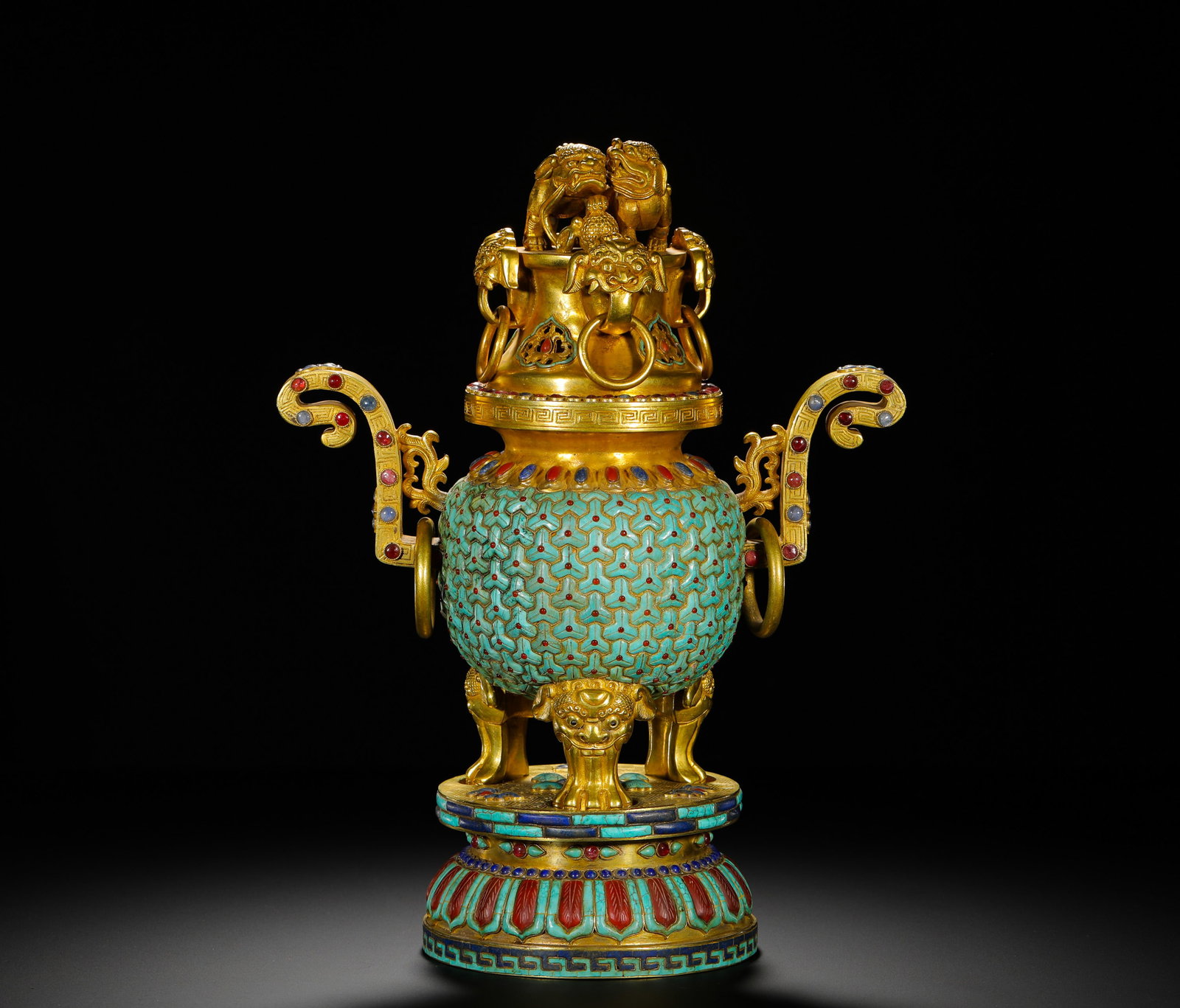 QING DYNASTY GILDED BRONZE INCENSE BURNER WITH TURQUOISE INLAID ANIMAL FEET: Height:30cm(11.81in) Width:23cm(9.06in) Weight:2860g(6.30lb)Gilt bronze censer with big and small lion knob, beast feet and original base, Qing Dynasty. Matched with a double-layer lotus base, the bod