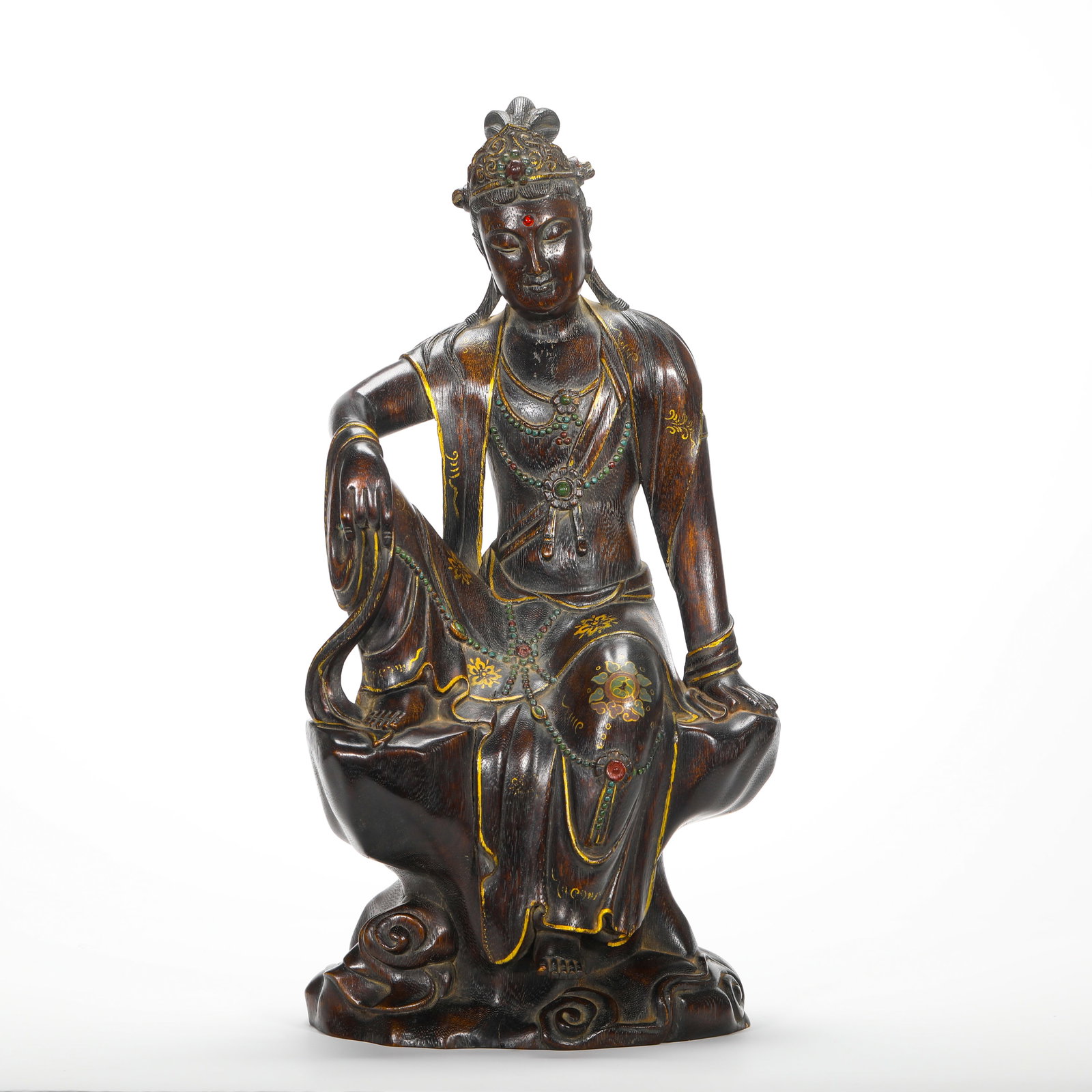 SEATED SEATED GUANYIN IN PURPLE SANDALWOOD INLAID WITH JEWELS AND GILDED