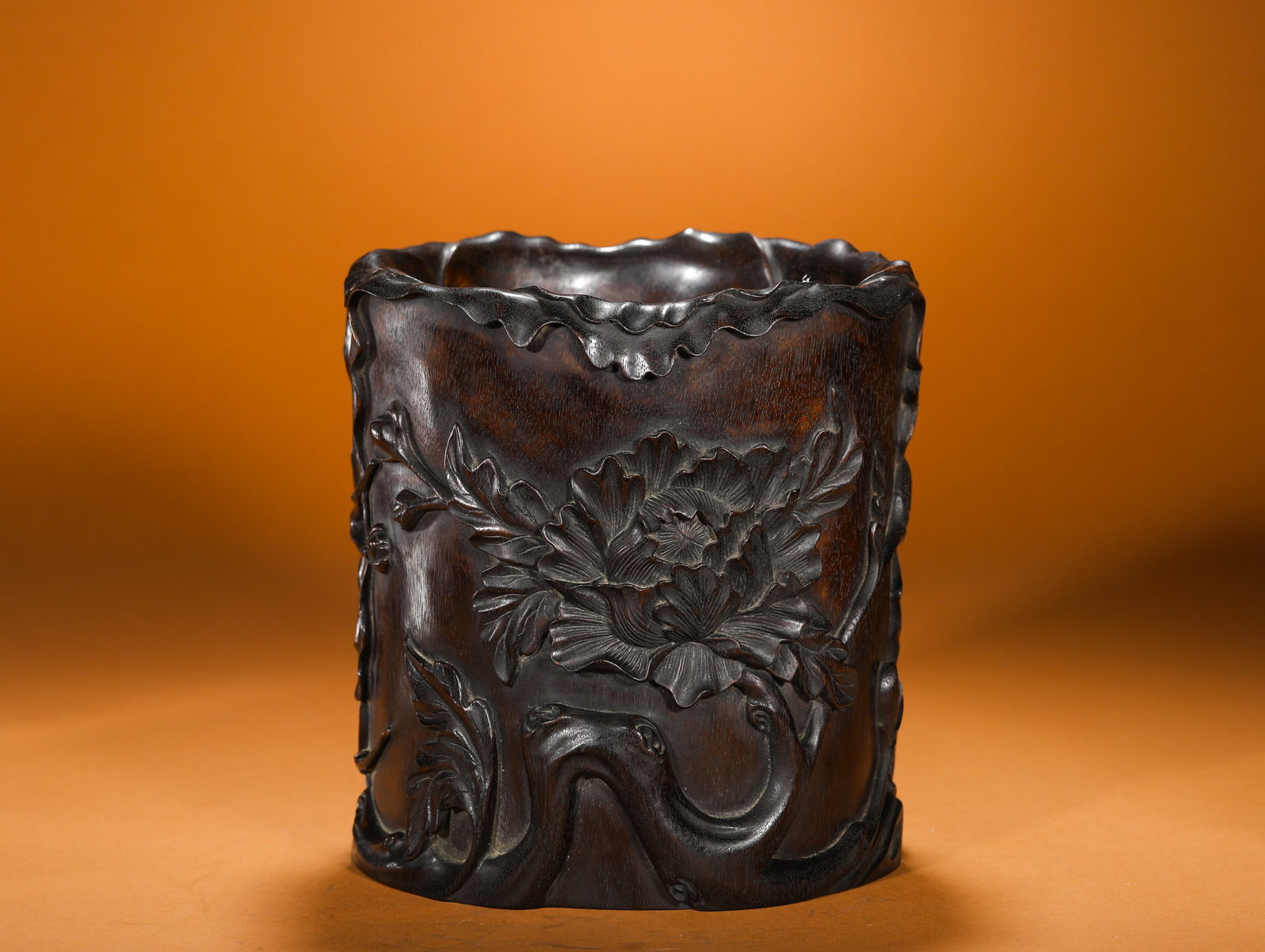 QING DYNASTY ROSEWOOD CARVINGS OF PEONY-PATTERNED PEN HOLDERS