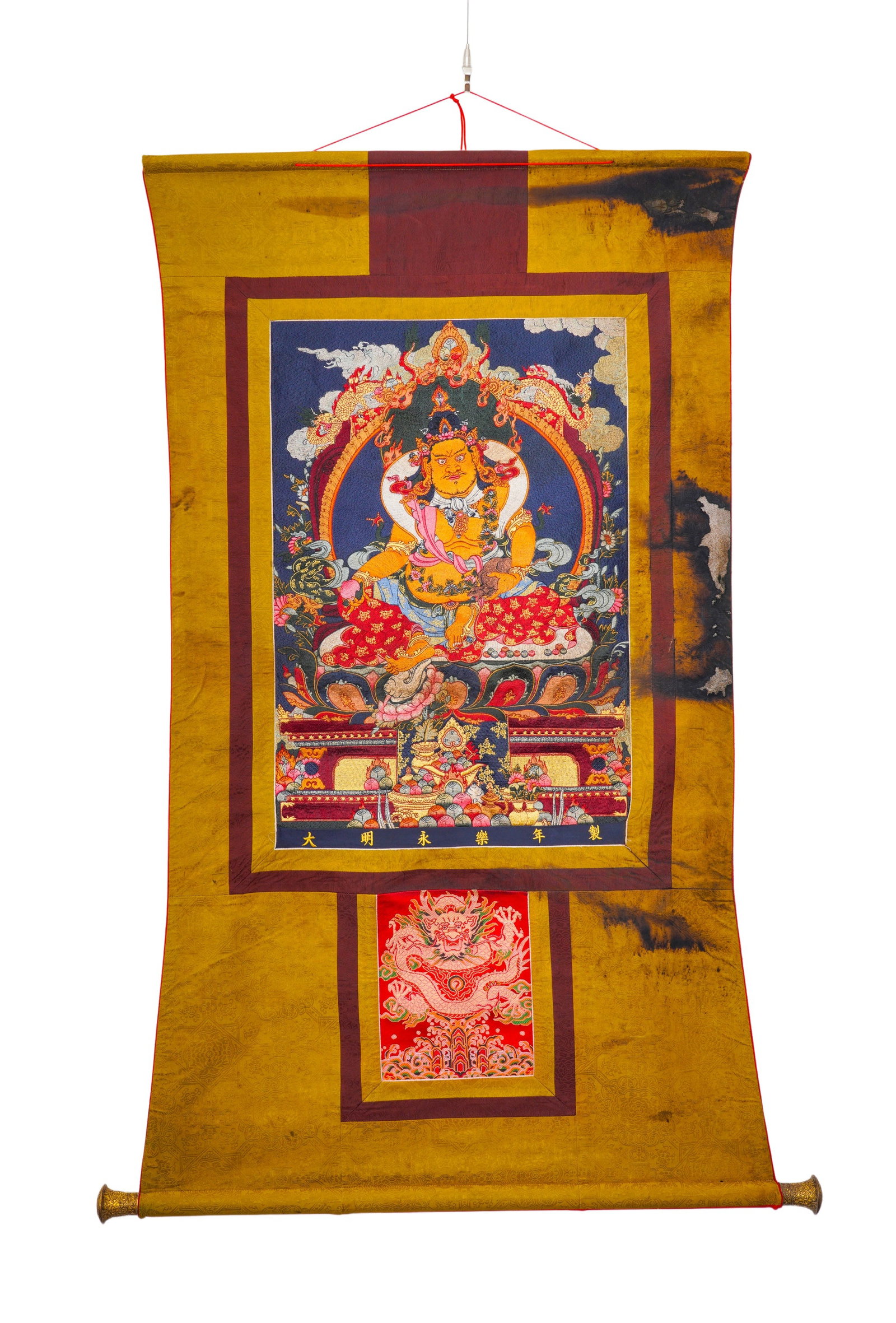 EMBROIDERY THANGKA OF THE YELLOW GOD OF WEALTH FROM THE MING DYNASTY