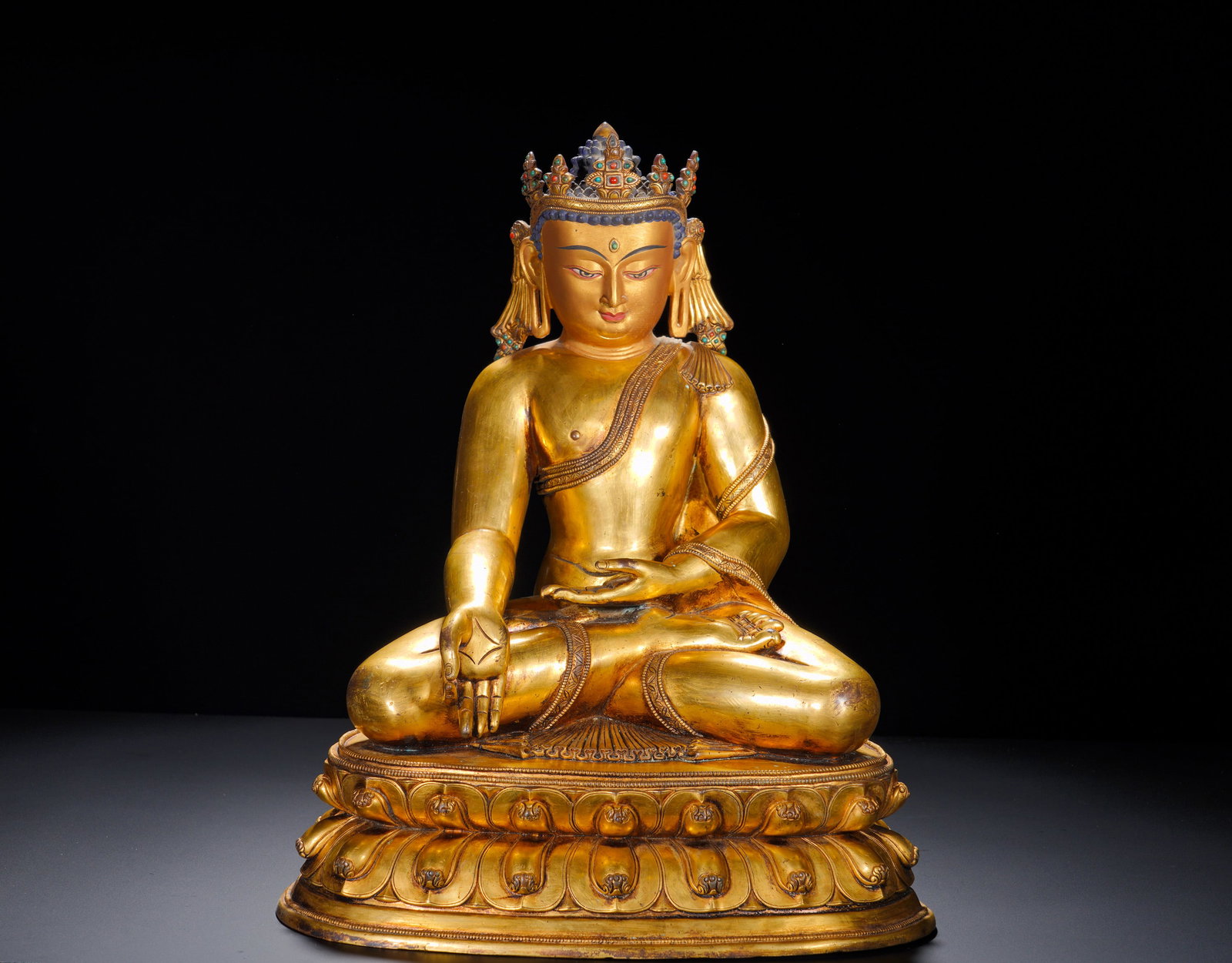 A GILDED BRONZE CROWN OF SAKYAMUNI BUDDHA FROM THE MING DYNASTY (1 of 10)