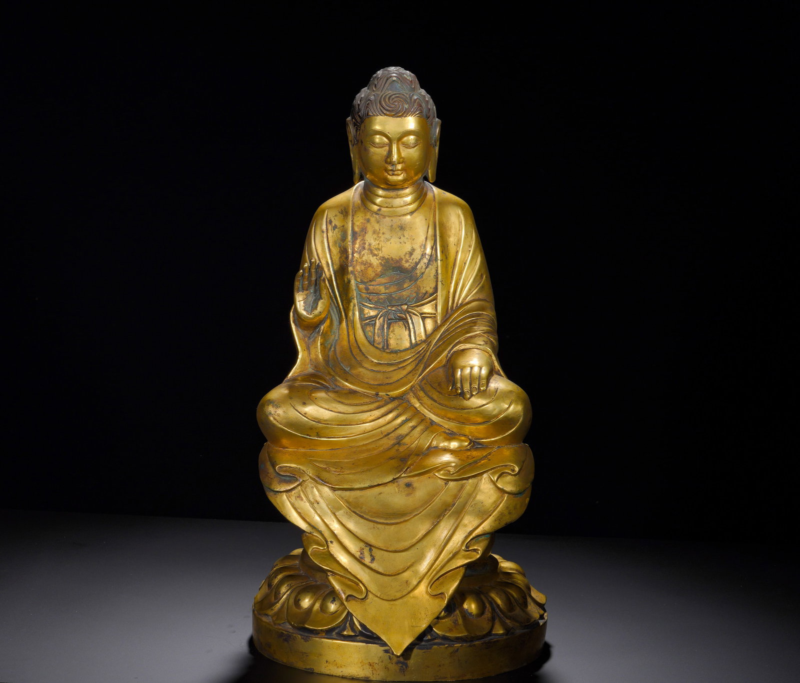 A GILDED BRONZE STATUE OF SAKYAMUNI BUDDHA FROM THE TANG AND MING DYNASTIES (1 of 12)
