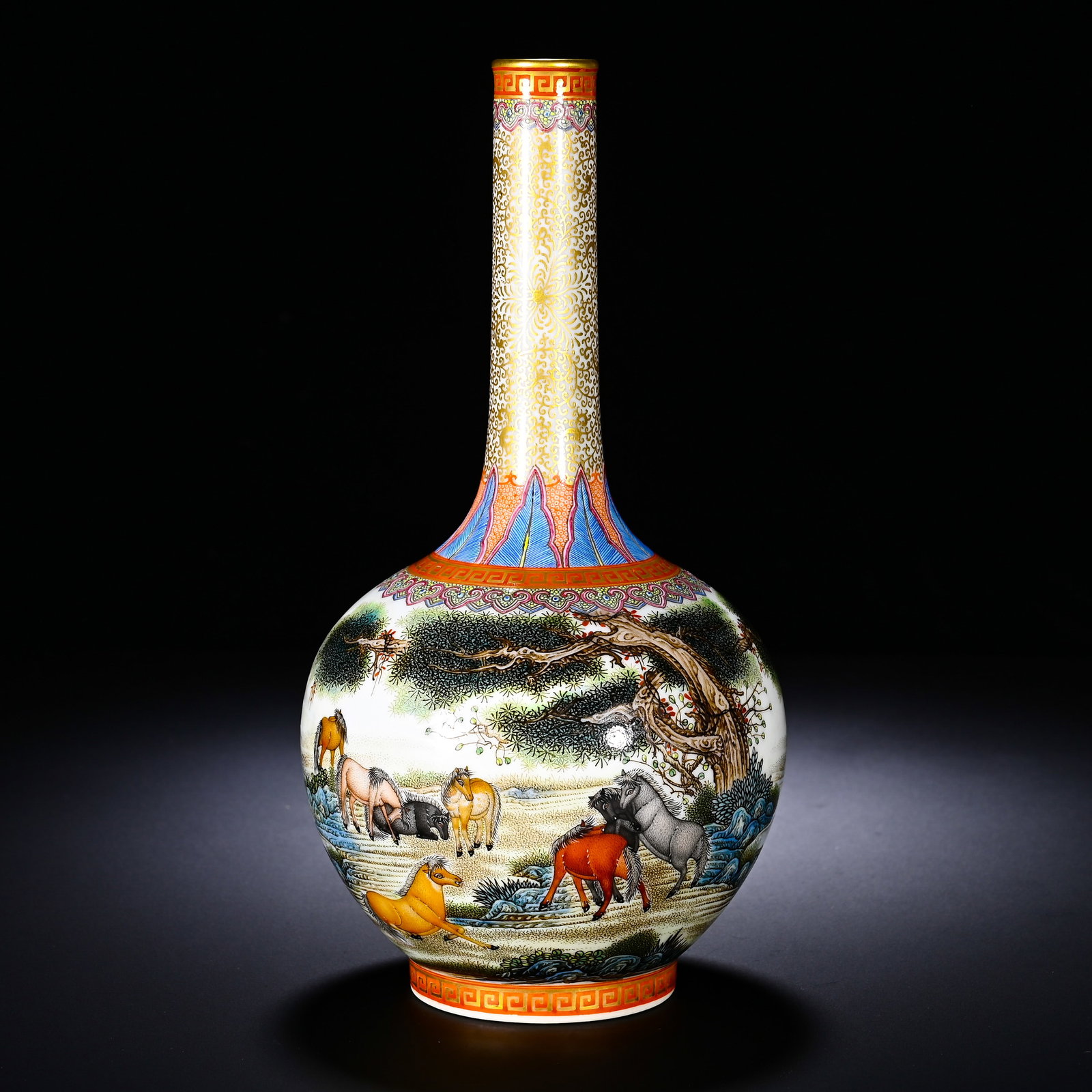 QING DYNASTY QIANLONG PASTEL EIGHT HORSES PICTURE CELESTIAL SPHERE VASE: Height: 22cm(8.66in), Diameter: 9cm(3.54in)This is a Qianlong?period famille?rose celestial?sphere vase with the Eight Horses motif. The long neck is decorated with gilded scrolling patterns, accompan