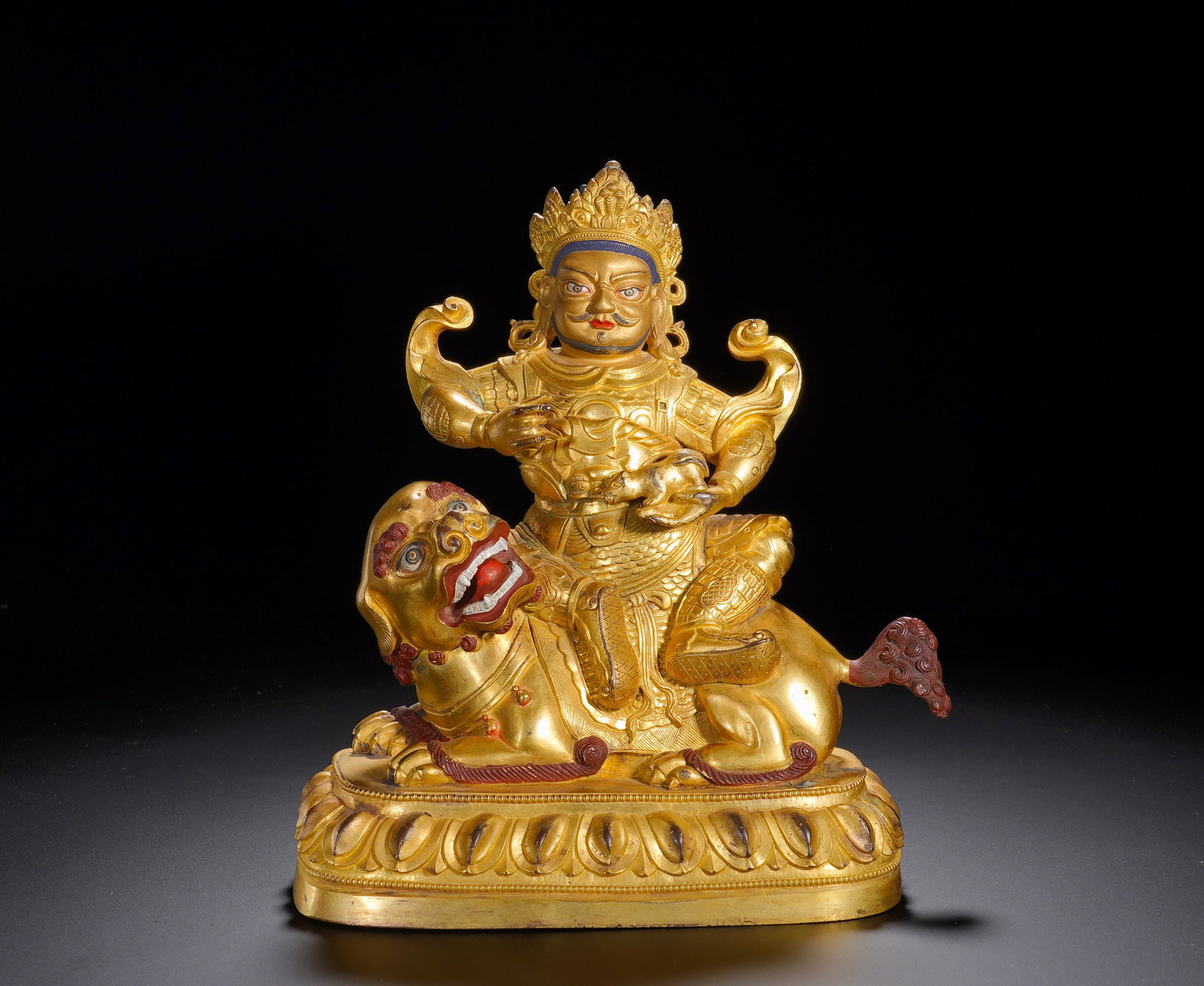 A GILDED BRONZE STATUE OF THE KING OF TREASURES FROM THE QING DYNASTY (1 of 10)