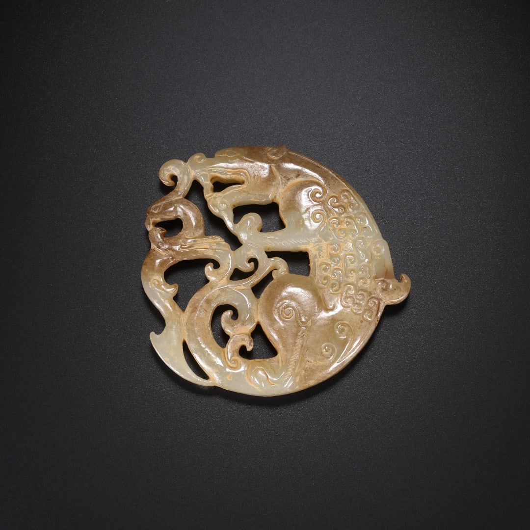HAN DYNASTY THROUGH-CARVED DRAGON AND PHOENIX-PATTERNED JADE PENDANT (1 of 9)