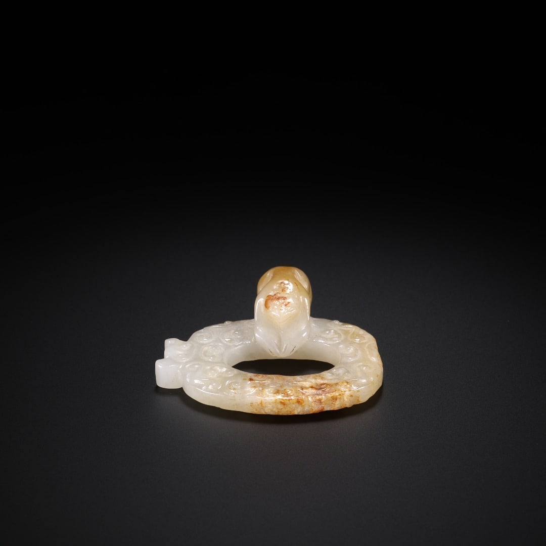 HAN DYNASTY HETIAN JADE CARVED CLIMBING CHI RING PENDANT: Length: 4.8cm(1.89in), Width: 4.4cm(1.73in), Thickness: 1.7cm(0.67in), Weight: 22g(0.048lb)Carved from white Hetian jade, this flat ring is densely decorated with shallow?carved scroll?cloud patterns,