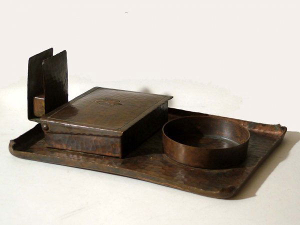 Arts & Crafts Era Carl Sorensen Smoking Set: Carl Sorensen Smoking Set Hammered Copper. An 8 3/4" x 6 1/2" tray with attached ashtray, cigarette box and match box holder. Bears the S inside circle Carl Sorensen mark. From early 1900's.