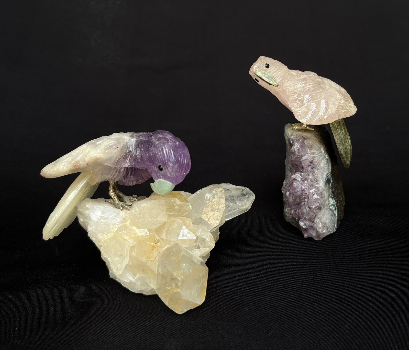 Pair Amethyst & Quartz Parrot Sculptures: Set of 2 Semi-precious Gemstone Bird Sculptures Amethyst and Quartz Parrots Quartz Parrot Sculpture Dimensions: Height: 4 in. Length: 3 in. Width: 3 in. Provenance: Private Collection, Laguna Niguel, 