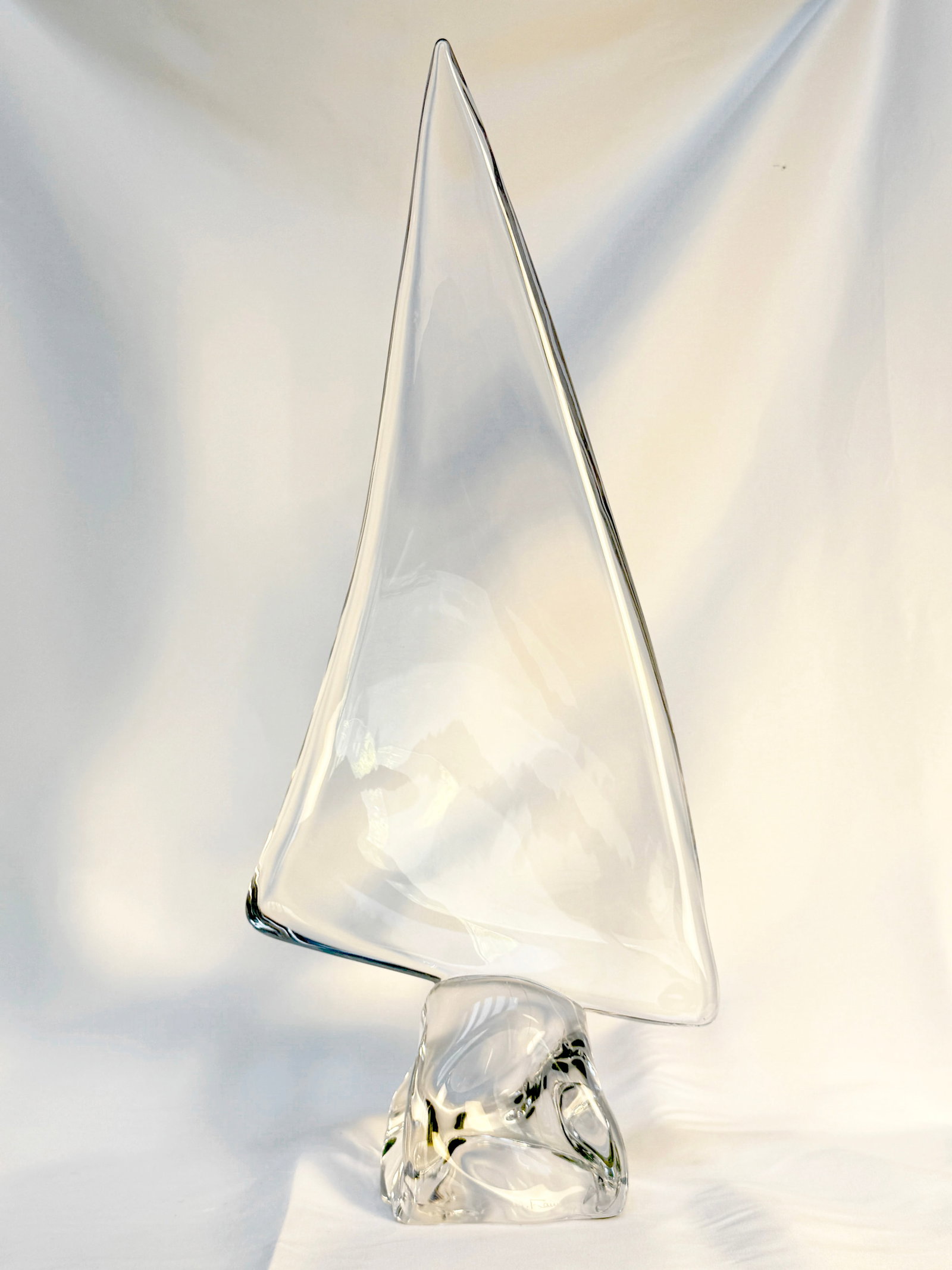 Large Crystal Sailboat Sculpture by Daum, France: Large crystal sailboat sculpture by Daum, France, circa 1970s. The sculpture is signed "Daum France" on the base. Dimensions: Height: 16.5 in (41.91 cm) Width: 8 in (20.32 cm) Depth: 4.5 in (11.43 cm)