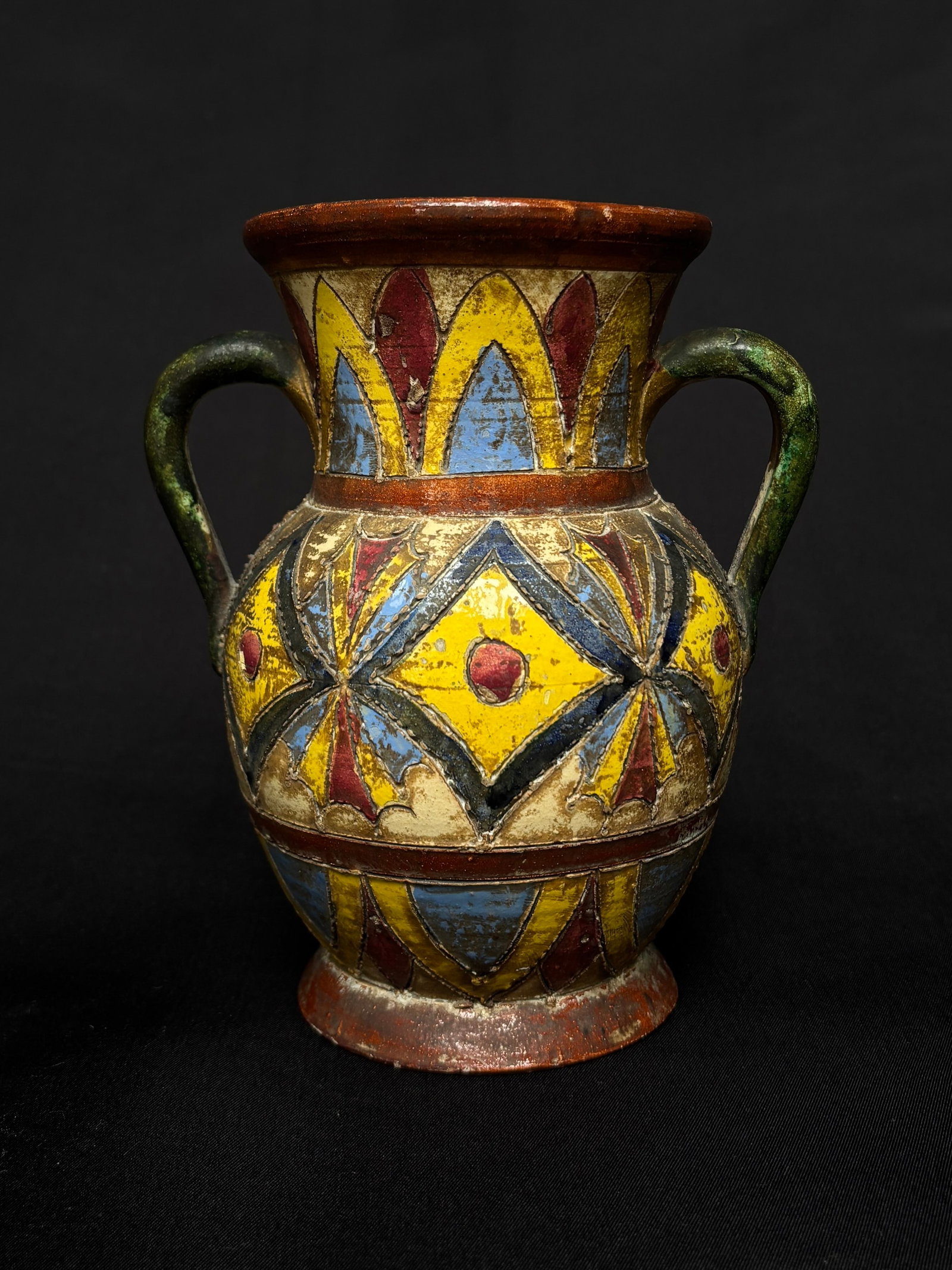 Italian Sgraffito Vase, Early/Mid-20th Century: Italian Sgraffito Clay Vase, Early or Mid-20th Century. Vintage Italian Vase features a colorful, hand-painted sgraffito design with intricate geometric patterns. Crafted from rustic clay with double 