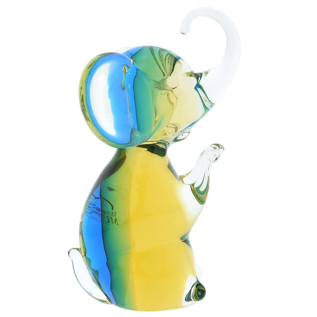 Murano Glass Elephant - Amber Aqua: A lovely accent to any interior decor, this adorable Murano Glass Elephant instantly creates cheerful and light ambiance. With its whimsical design and rich colors evoking bright Venetian morning, thi