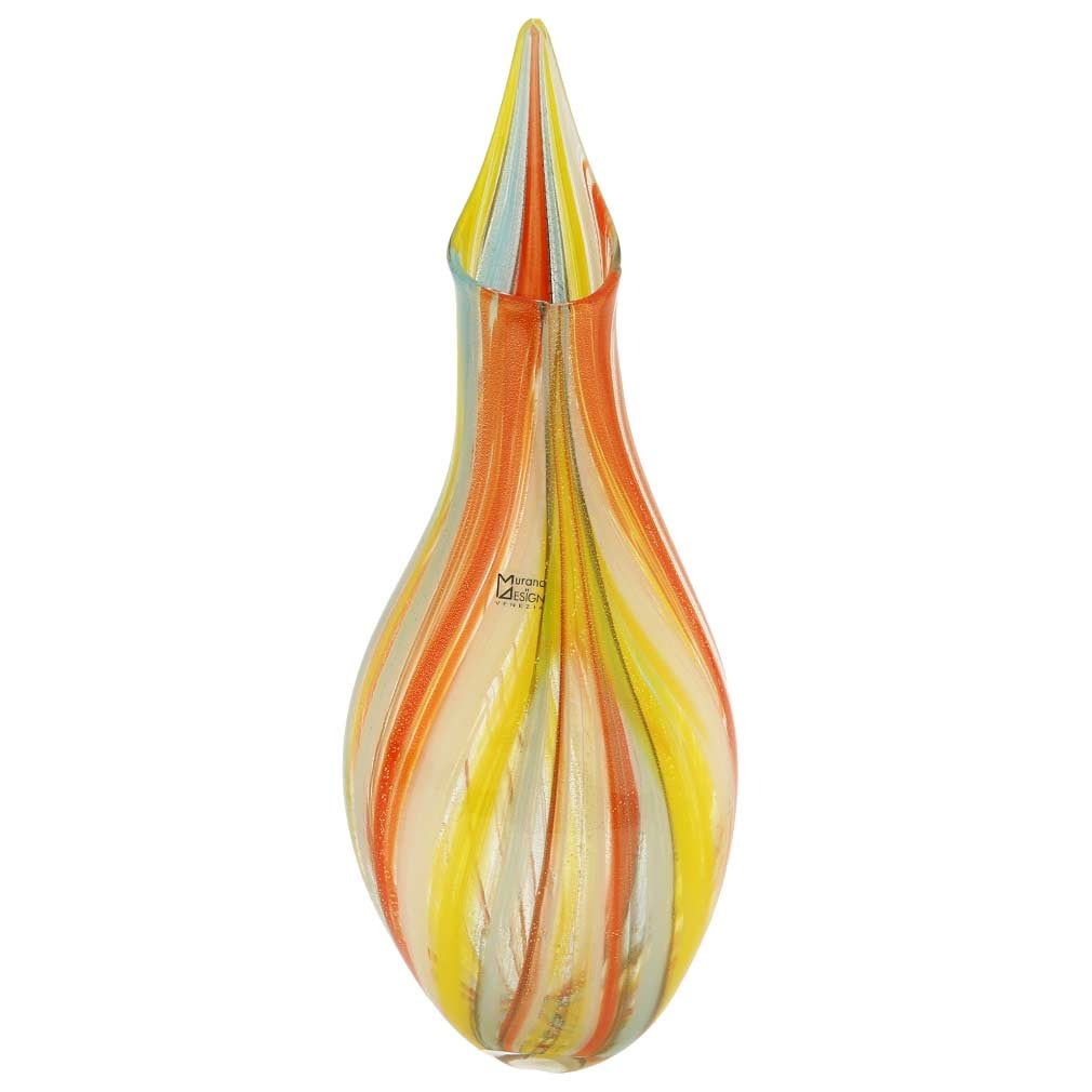Murano Glass Spring Blossom Vase - Multicolor: This Murano Glass Vase features exquisite flower blossom-inspired shape and lively pattern of streaks of warm yellows, reds, and aquamarine against transparent background. A generous sprinkling of gol