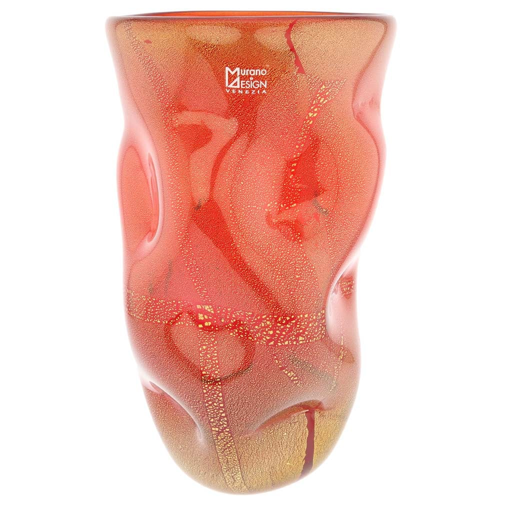 Murano Glass Wavy Vase - Red Gold: The elegant fluid shape and classic deep red color of this Murano Glass Vase accented by the shimmering gold leaf infused in the glass make this vase an instant conversation-starter. A unique material