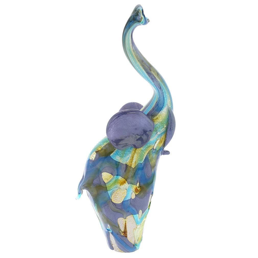 Murano Glass Shimmering Elephant Sculpture: This stunning Murano Elephant represents the uniqueness, artistry, and beauty of authentic Murano Glass. The Elephant's imaginative style and design, which builds on the artistic trends of the 19th an