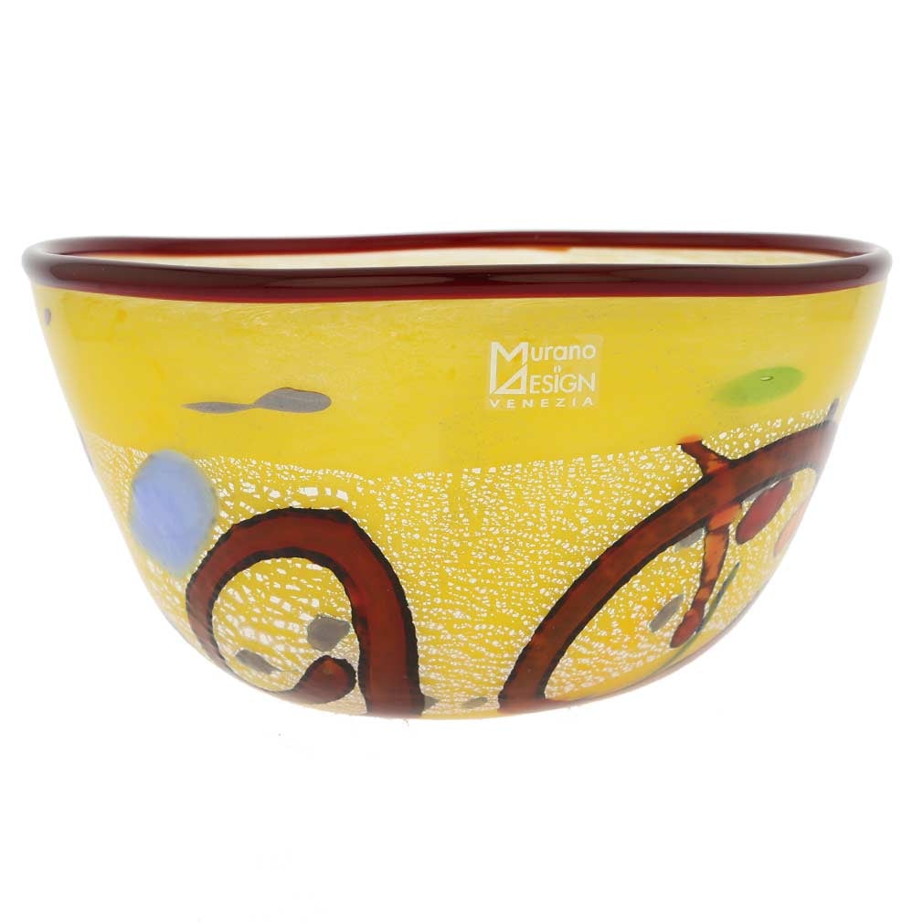 Murano Glass Modern Art Bowl - Yellow: The bold design and rich yellow color of this Murano Glass Bowl, accented by the shimmering silver leaf infused in the glass, make it a standout at your table and in your home. Created by famous Muran