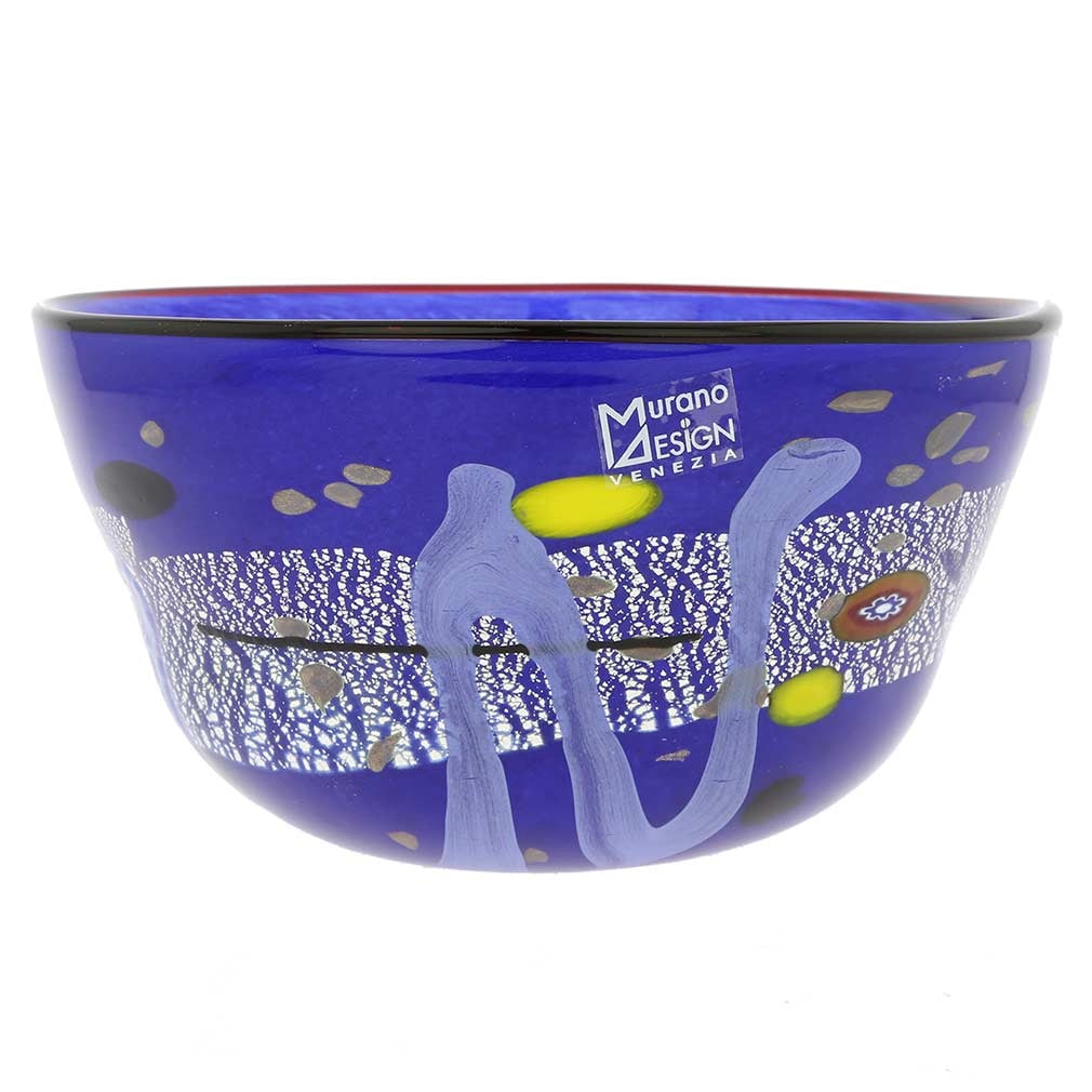 Murano Glass Modern Art Bowl - Blue: The bold design and rich blue color of this Murano Glass Bowl, accented by the shimmering silver leaf infused in the glass, make it a standout at your table and in your home. Created by renowned Muran