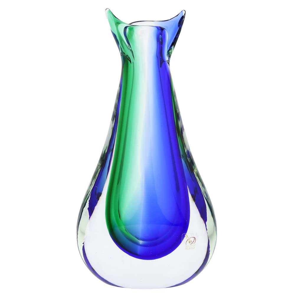 Murano Glass Sommerso Bud Vase - Green Blue: This fabulous Murano Glass Vase presents a contemporary take on classic Venetian glass-making technique called Sommerso. By ingeniously layering colored glass, Murano masters achieve a unique look, wh