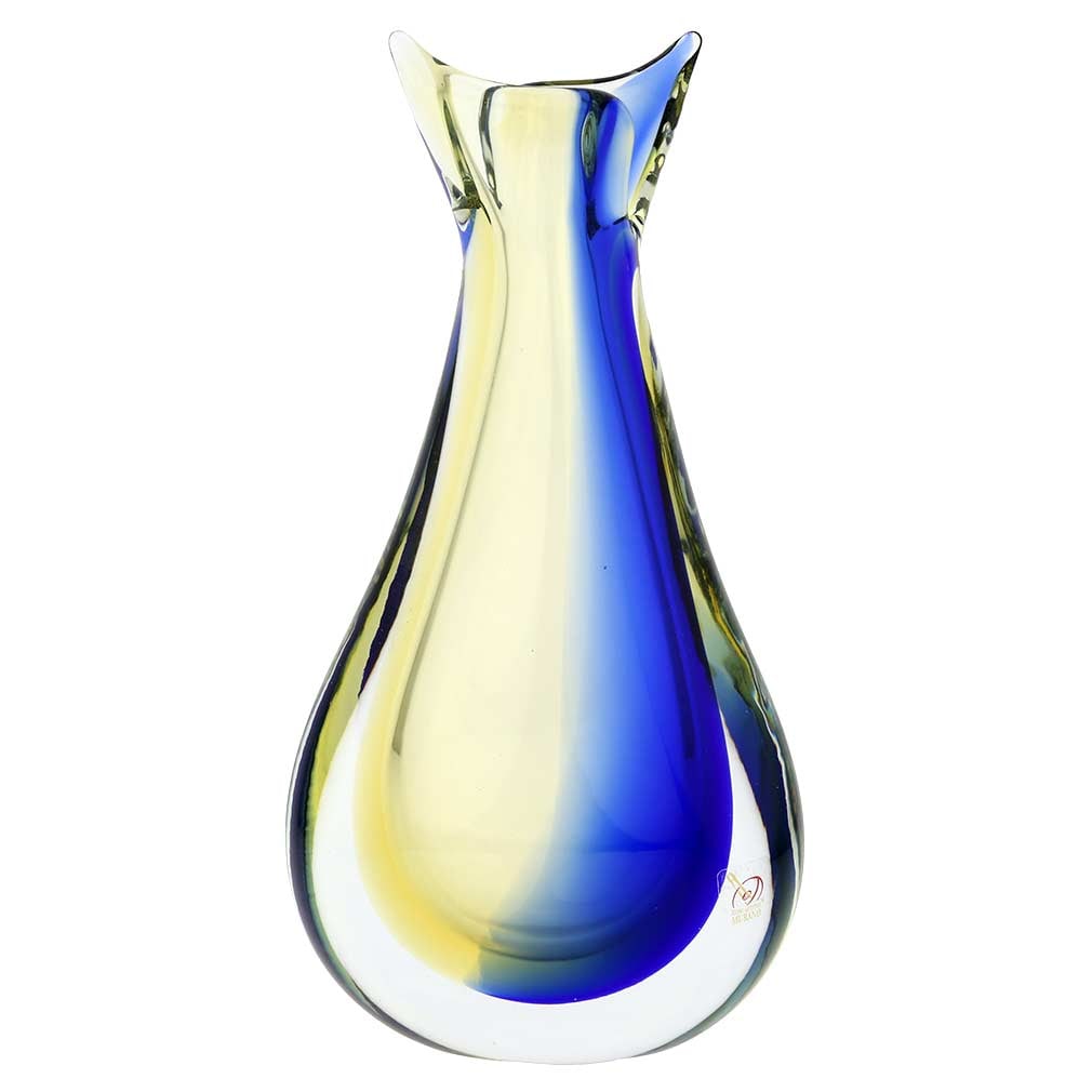 Murano Glass Sommerso Bud Vase - Amber Blue: This fabulous Murano Glass Vase presents a contemporary take on classic Venetian glass-making technique called Sommerso. By ingeniously layering colored glass, Murano masters achieve a unique look, wh