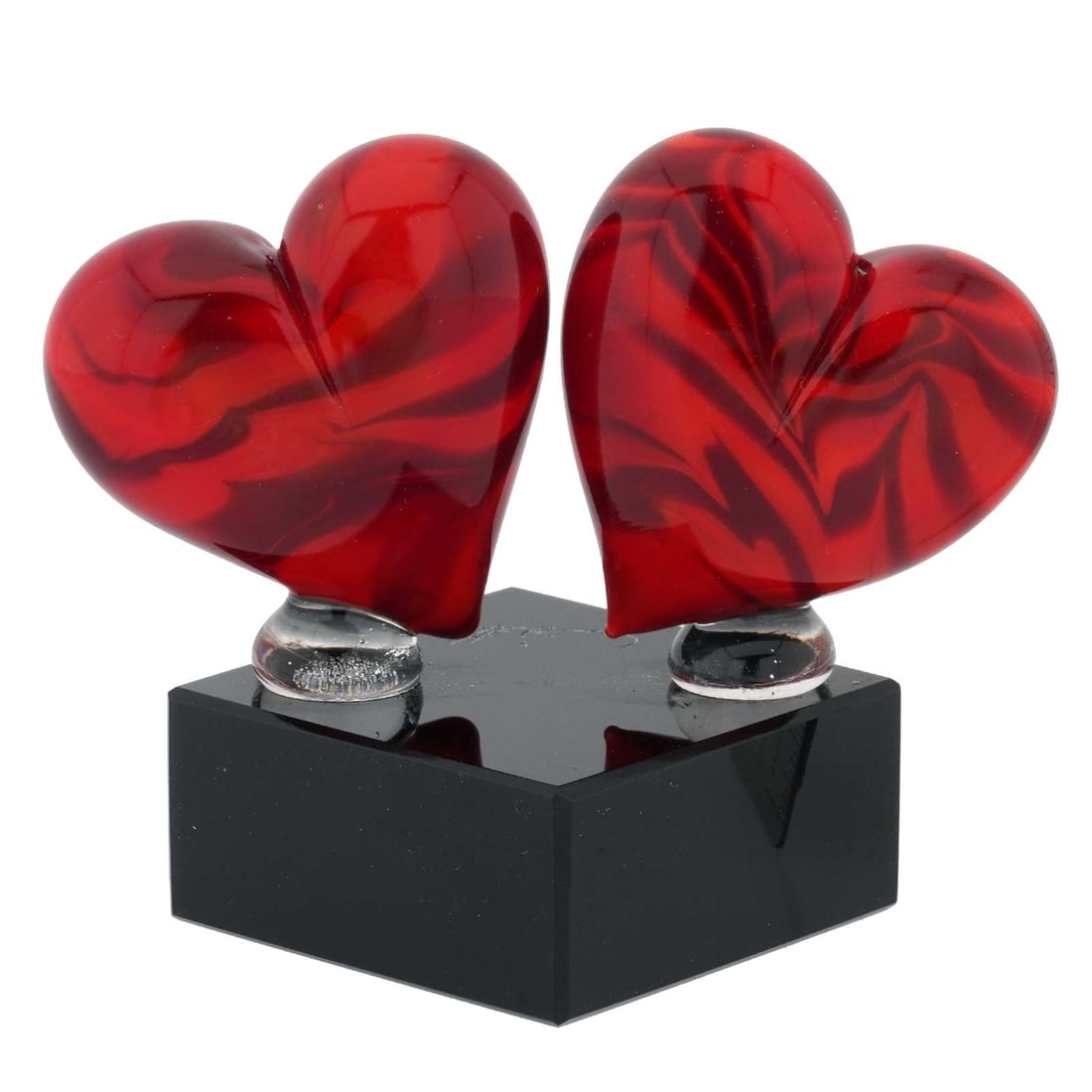 Murano Glass Red Hearts On Base: Venice, the city of canals, gondolas gliding next to beautiful palaces, and quiet medieval alleyways, is well known as the most romantic place in the world. Combine that with Murano's ancient glassmak