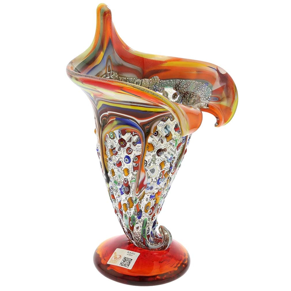 Murano Glass Millefiori Horn Of Plenty Vase - Multicolor: This gorgeous Murano Glass Vase is not only a beautiful piece of art but a meanigful symbol cherished in Western Art, a Horn Of Plenty. With its connotation of abundance, prosperity, and good fortune,