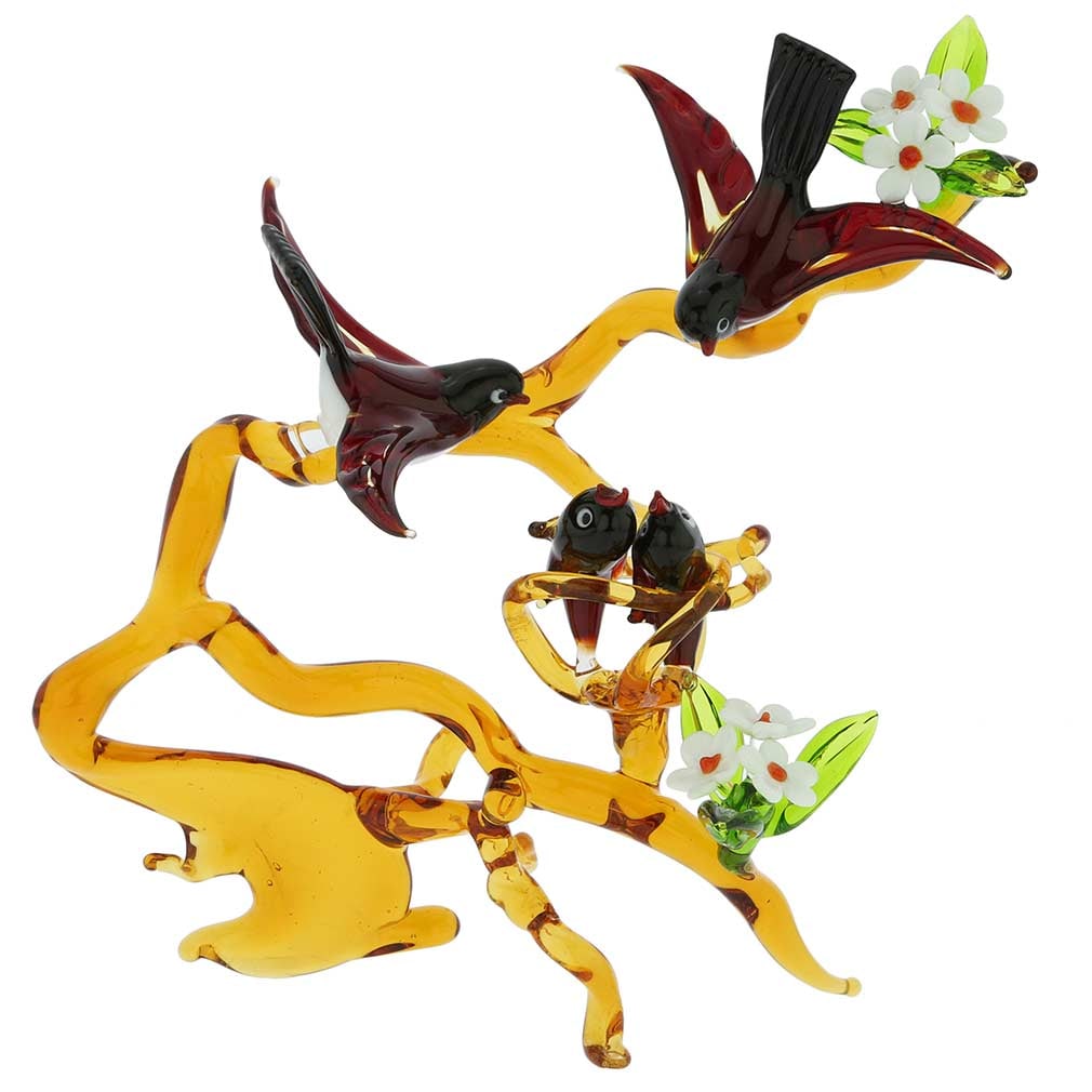Murano Glass Birds on a Branch with Nest - Red: You cannot help but imagine yourself in one of Venice's enchanted gardens lulled by the bird song and dazzled by the harmony of man-made beauty and nature when you set your eyes on this meticulously c