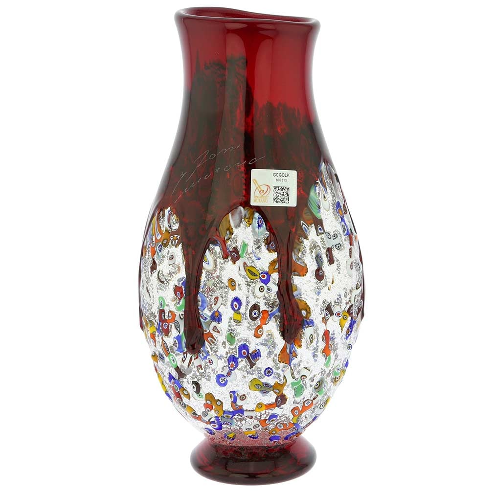 Murano Glass Millefiori Art Glass Bottle Vase - Red: This magnificent blown Murano Glass vase features elegant design, deep colors, and exquisite detail - the key characteristics of the work of famed Murano Glass masters. Like a splash of precious stone