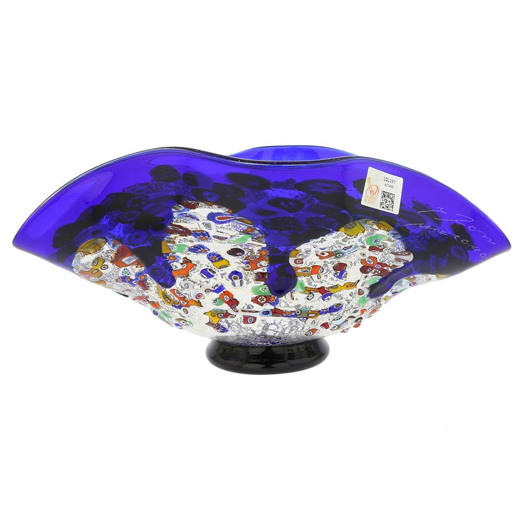 Murano Millefiori Art Glass Wavy Bowl - Blue: This magnificent blown Murano Glass vase features rich radiant colors, fine workmanship, and unique artistic form, all of which highlight the mastery and artistic talent of Murano Glass makers. Festiv