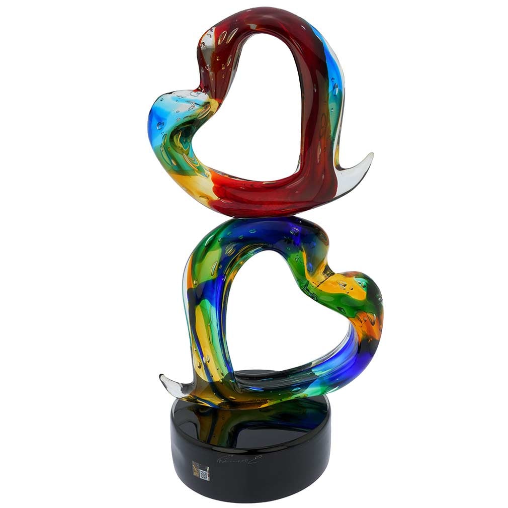 Murano Glass Stacked Hearts Sculpture: Directly from Venice, the world capital of art glass, comes this stunning Murano Glass Hearts sculpture. Echoing the aesthetics of the twentieth century art, this sculpture explores movement and depth