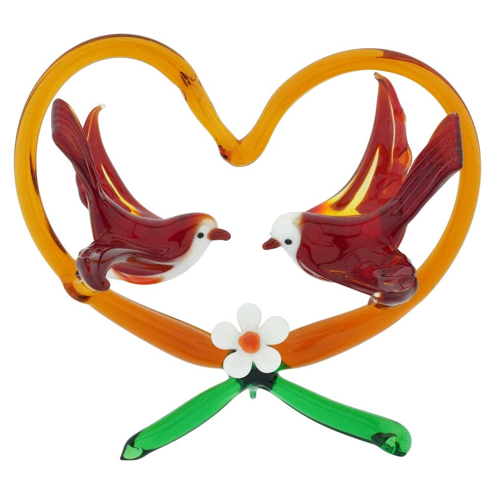 Murano Glass Birds On Red Heart - Red: A beautiful romantic sculpture from the workshops of talented Murano artisans, this pair of Murano Glass birds inside a red heart is a symbolic representation of love, tenderness, and care, something 