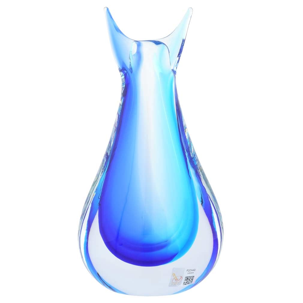 Murano Glass Sommerso Bud Vase - Aqua Blue: This fabulous Murano Glass Vase presents a contemporary take on classic Venetian glass-making technique called Sommerso. By ingeniously layering colored glass, Murano masters achieve a unique look, wh