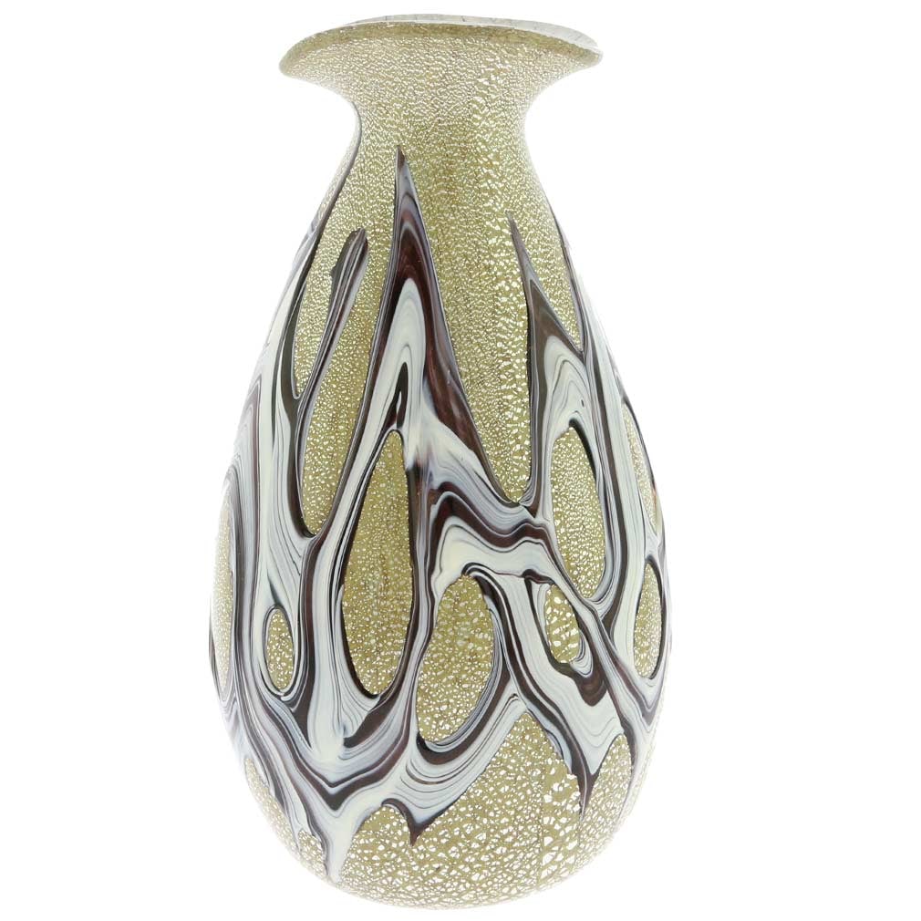 Murano Glass Silver Vase - Purple Web: This one-of-a-kind creation born out of fire in the famous ancient Murano glass furnaces is a statement of contemporary sophistication and artistic excellence. An amazing web of rich amethyst glass ve