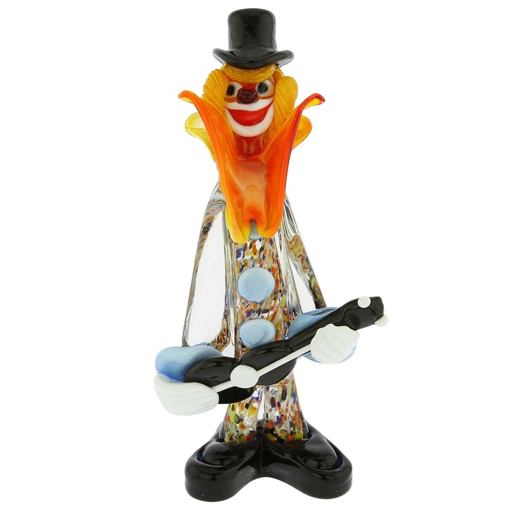 Murano Glass Clown With Guitar: This Murano Glass clown is ready to entertain with guitar in his hand, a wide smile, and a cute exaggerated bow-tie. This elegant clown sculpture is created in the famous workshop on Murano Island by 