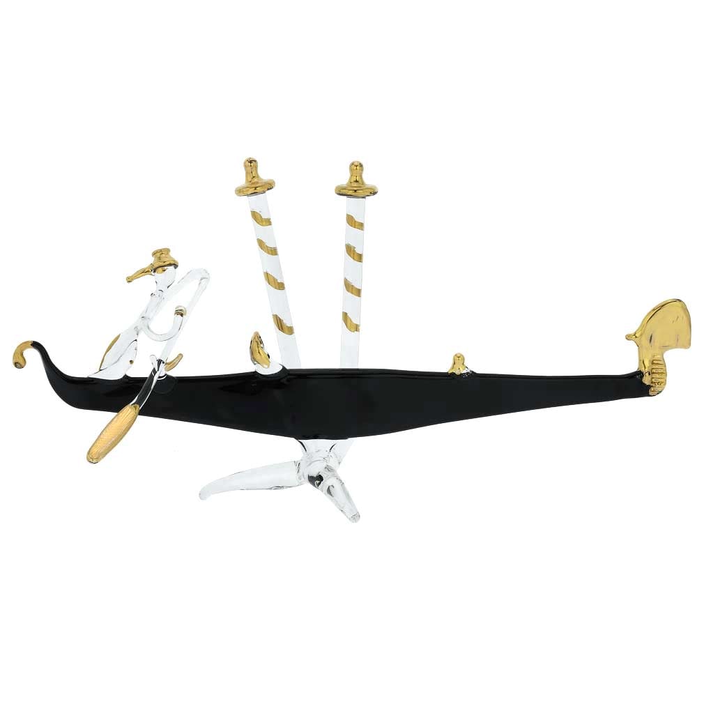 Murano Glass Flat Gondola With Gondolier - Medium: Made by Murano's talented and passionate glass artists following centuries of Murano glass-making tradition, this classic black and gold gondola is a timeless symbol of the beauty, elegance, and uniqu