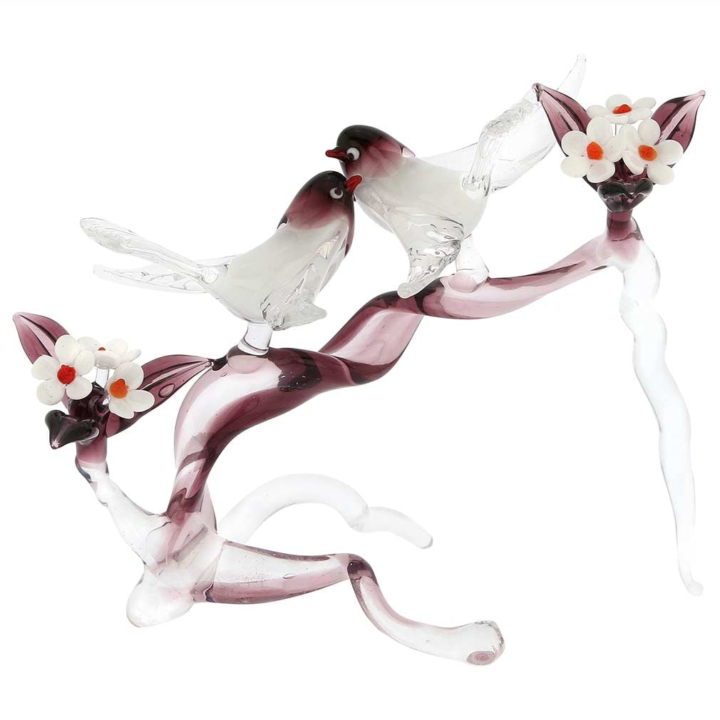 Murano Glass Birds on a Cherry Branch - Purple: Bring the passion of Venice into your home with this beautiful Murano Glass bird sculpture showcasing the mastery and artistic talent of Murano Glass masters. In this wonderful representation of timel