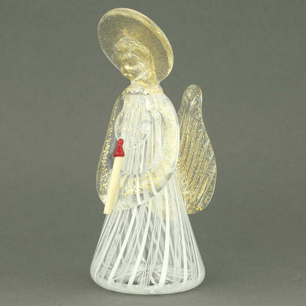 Murano Glass Reticello Angel: Elegant, spiritual and unique, this Murano Glass Angel figurine is handcrafted by talented Murano masters in the ancient traditions of the craft using centuries-old Reticello technique. Swirling lines