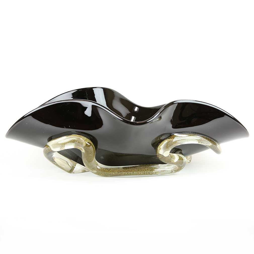 Murano Glass Centerpiece Bowl - Black and Gold: With a look of bold elegance, artistry and style, this gorgeous Murano Glass Bowl Centerpiece is a perfect piece to jazz up your interior design. Flowing shape, rare pitch-black glass, and graceful ba